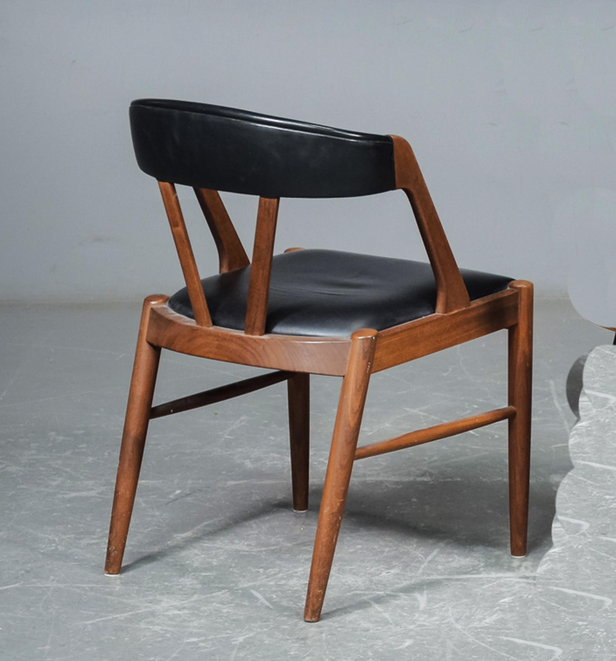 Armchair with solid teak frame, seat and headpiece upholstered. Designed in the early 1970s. In the style of Kai Kristiansen 