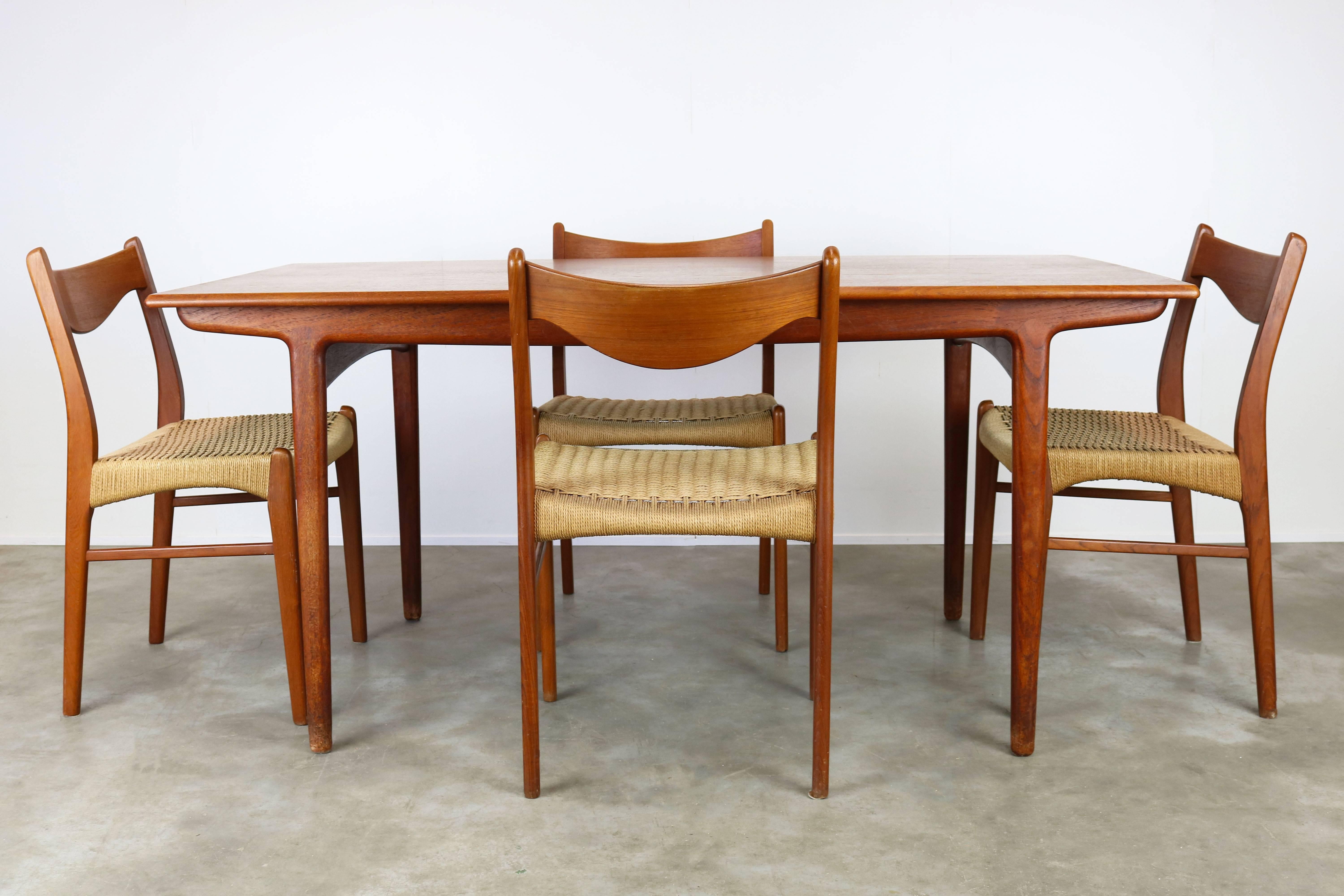 Very rare fully original Dining room set by the famous Danish design duo Ejner Larsen & Aksel Bender Madsen. The set consists of four solid teak and papercord sculpted chairs produced by the Glyngore Stolefabrik in 1950 and a matching sculpted solid