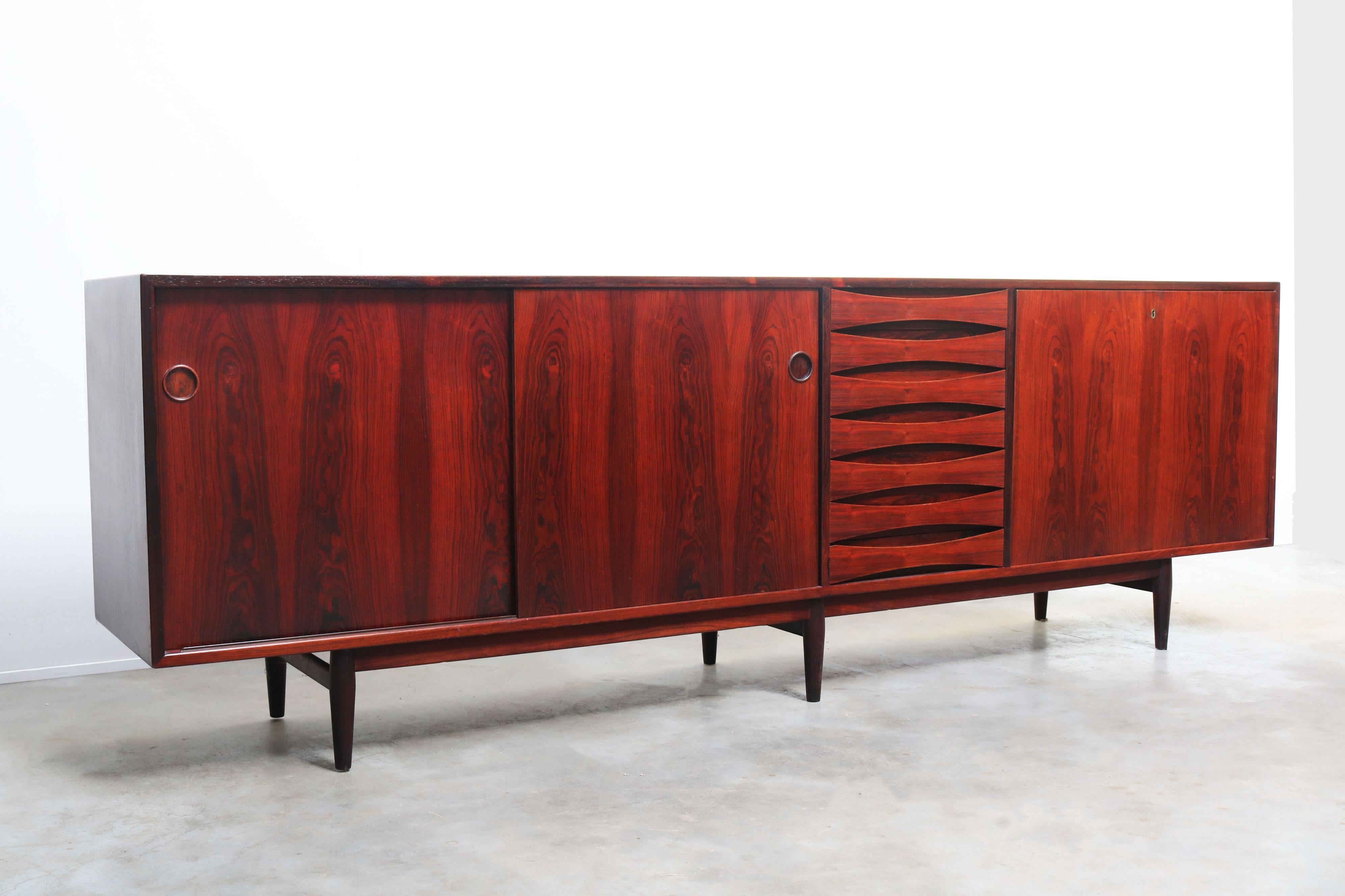 Danish Design Classic Sideboard, Model 29A in Rosewood by Arne Vodder for Sibast Furniture.
An iconic piece of Scandinavian modernism, this Model 29A sideboard was designed by Arne Vodder and produced by Sibast Furniture in Denmark during the