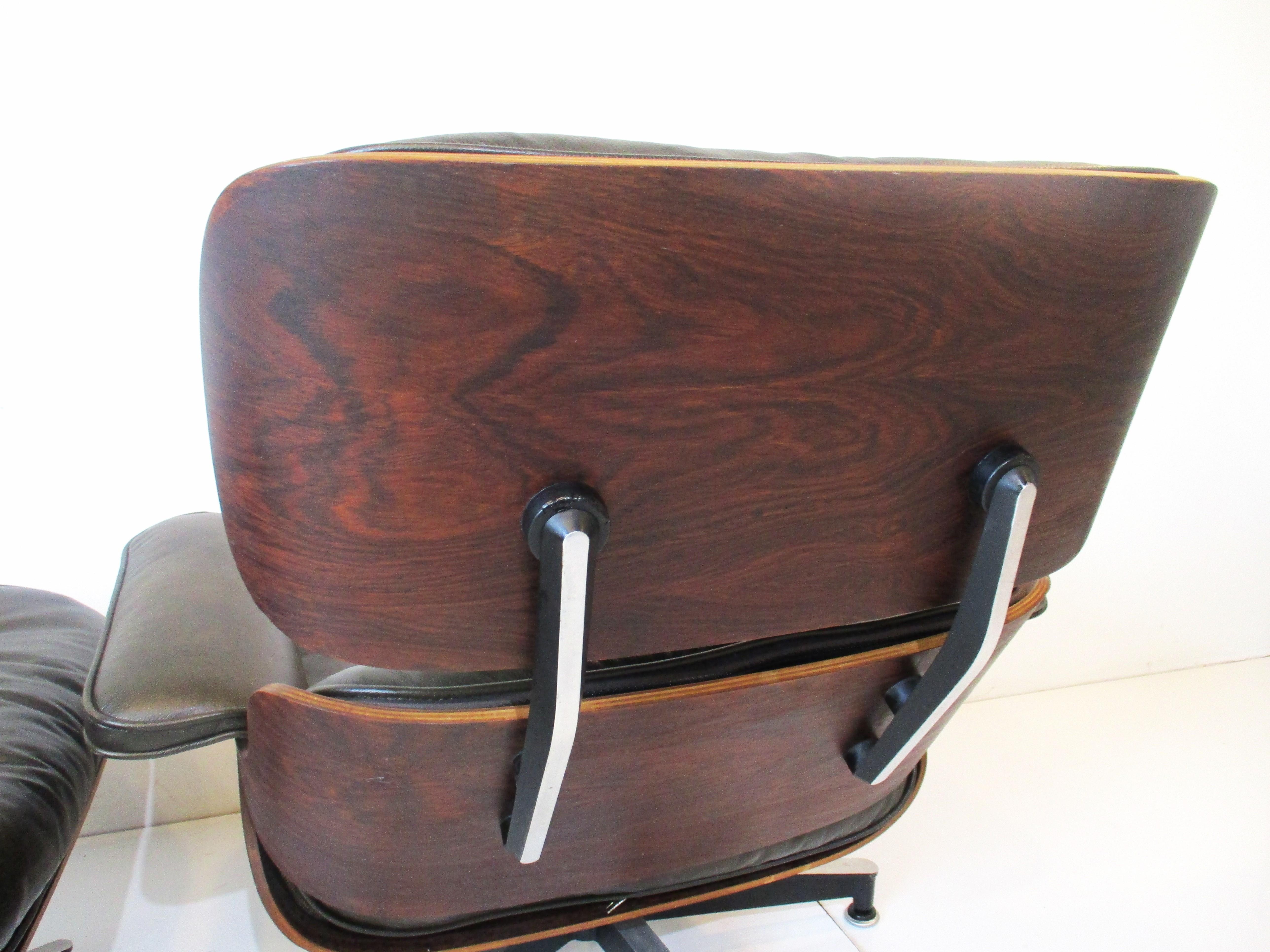 Eames fauteuil de salon rare vert foncé/rosewood 670 avec pouf  2