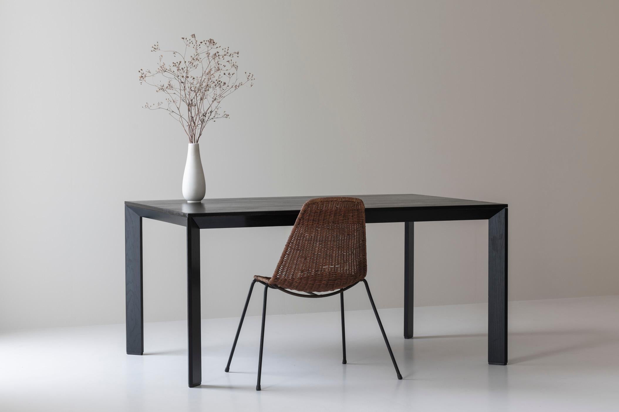 Rare dining table by Karl Andersson & Søn from Sweden, 1980s. This large dining table is made out of dark stained oak and remains in its original, very good condition with some visible signs from age and wear. Labeled underneath.
