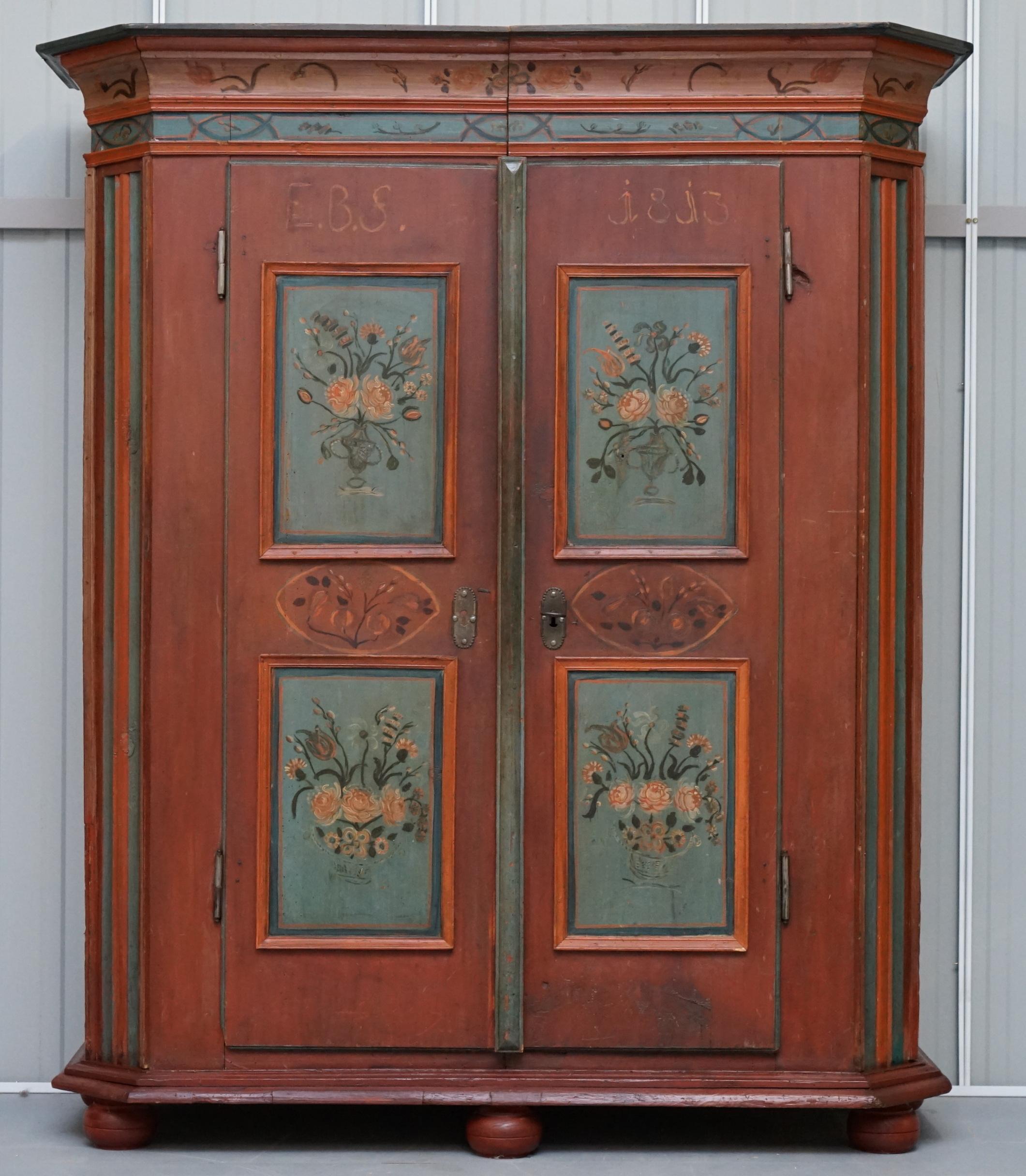 We are delighted to offer for sale this very rare dated 1813 hand painted Austrian wardrobe

A very rare find, naively painted with flowers, it’s all original, the lock has been restored and works perfectly, it looks like a piece of art

The