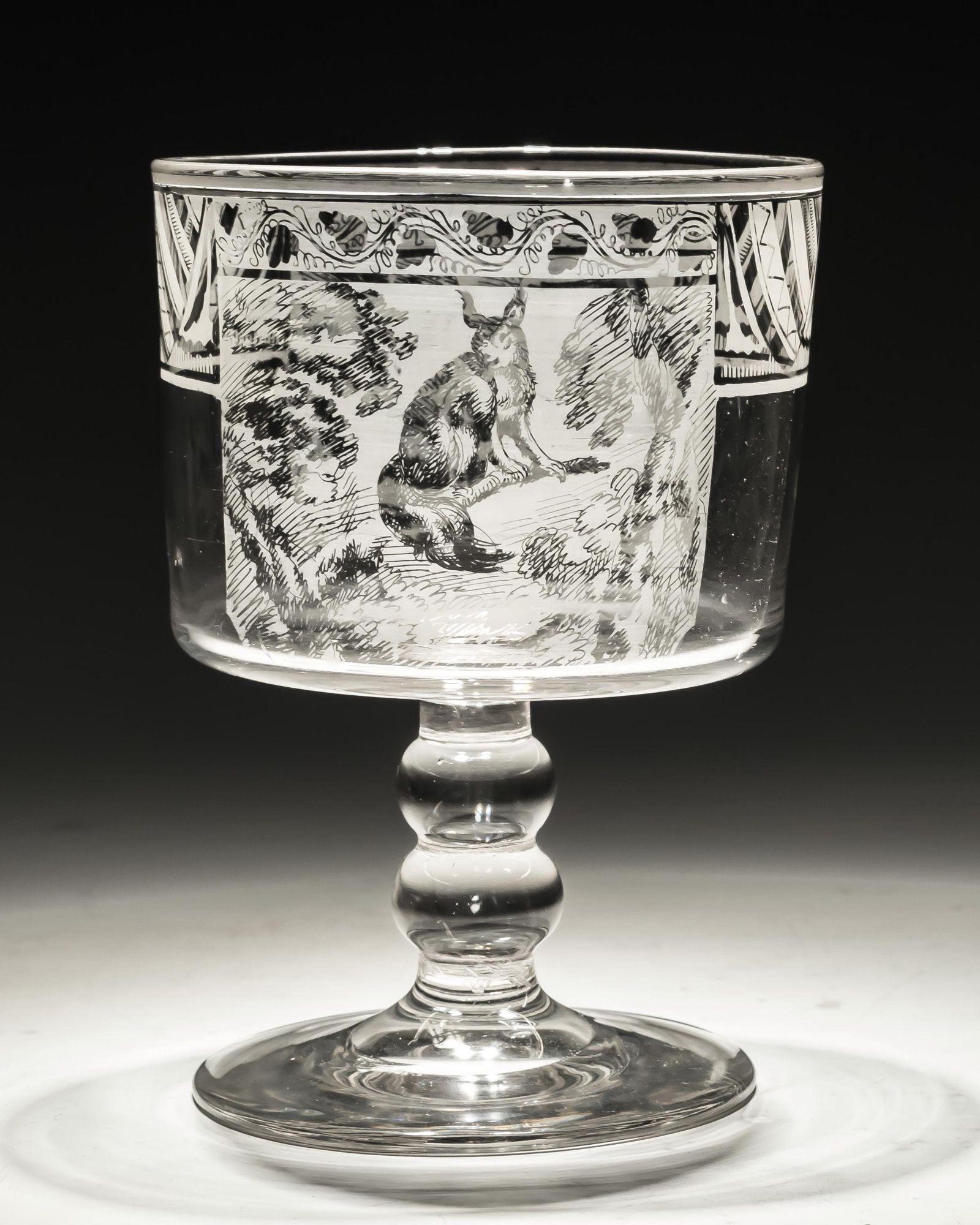 A rare Davenport patent goblet engraved with woodland scenes.

England, circa 1810.

Measures: Height: 13.5 cm (5 1/4