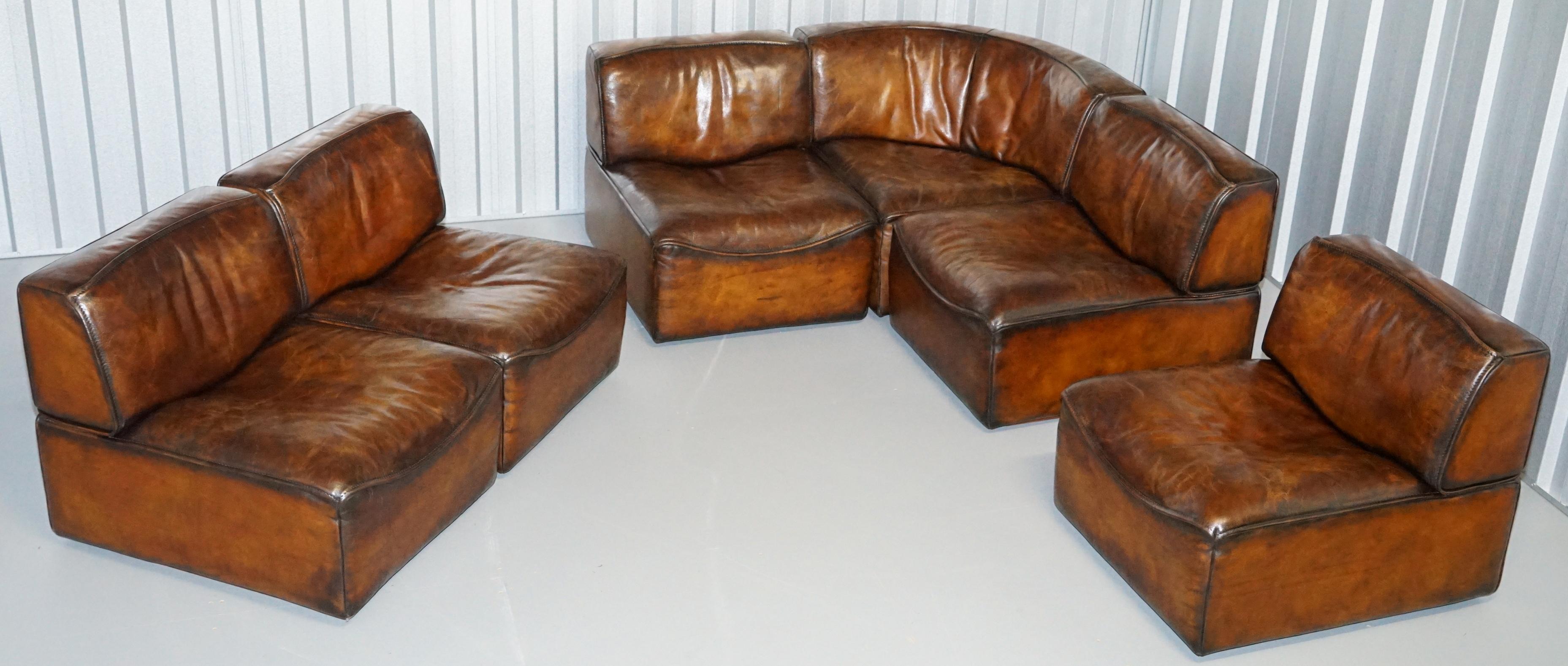 We are delighted to offer for sale this very rare fully restored hand dyed cigar brown leather original De sede DS15 sectional modular corner sofa suite with original paperwork dating to 1975

The DS15 is pure genius, you can have it arranged any