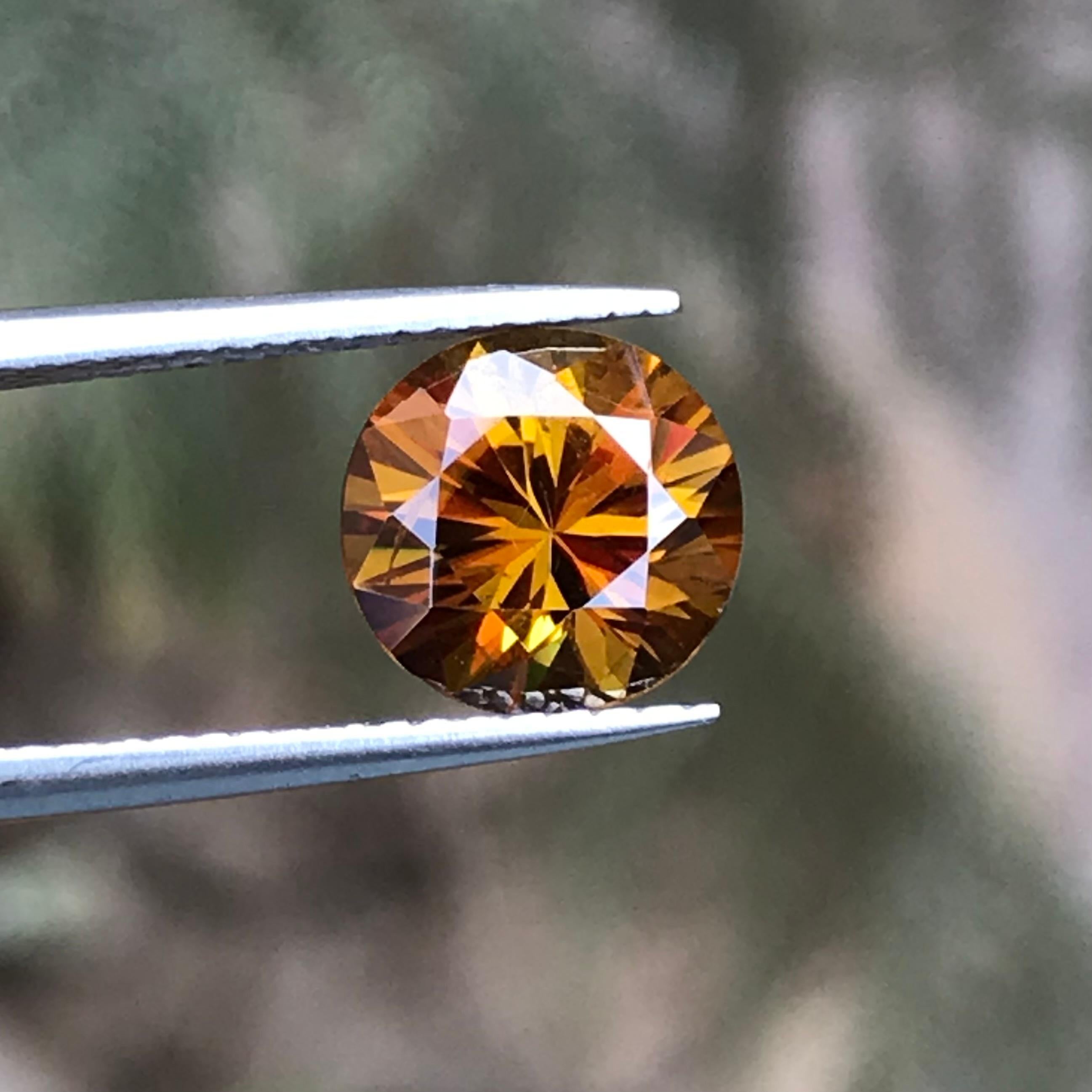 Contemporary Rare Deep Golden Yellow Natural Sphene 2.65 Ct Round Brilliant Cut for Ring etc For Sale