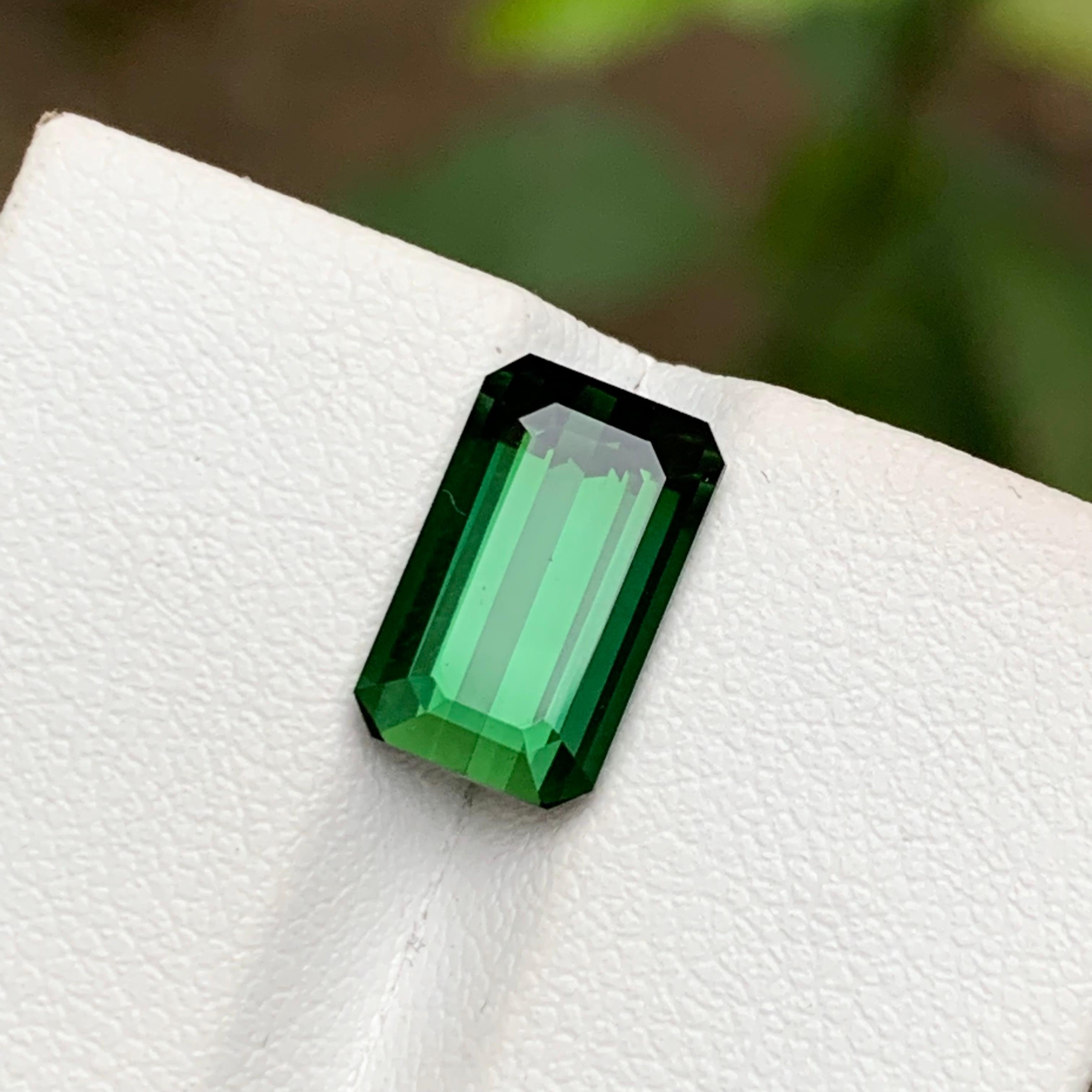 GEMSTONE TYPE: Tourmaline
PIECE(S): 1
WEIGHT: 3.75 Carats
SHAPE: Emerald 
SIZE (MM): 11.25 x 6.93 x 5.39
COLOR: Deep Green 
CLARITY: Eye Clean
TREATMENT: None
ORIGIN: Afghanistan 🇦🇫 
CERTIFICATE: On demand
(if you require a certificate, kindly
