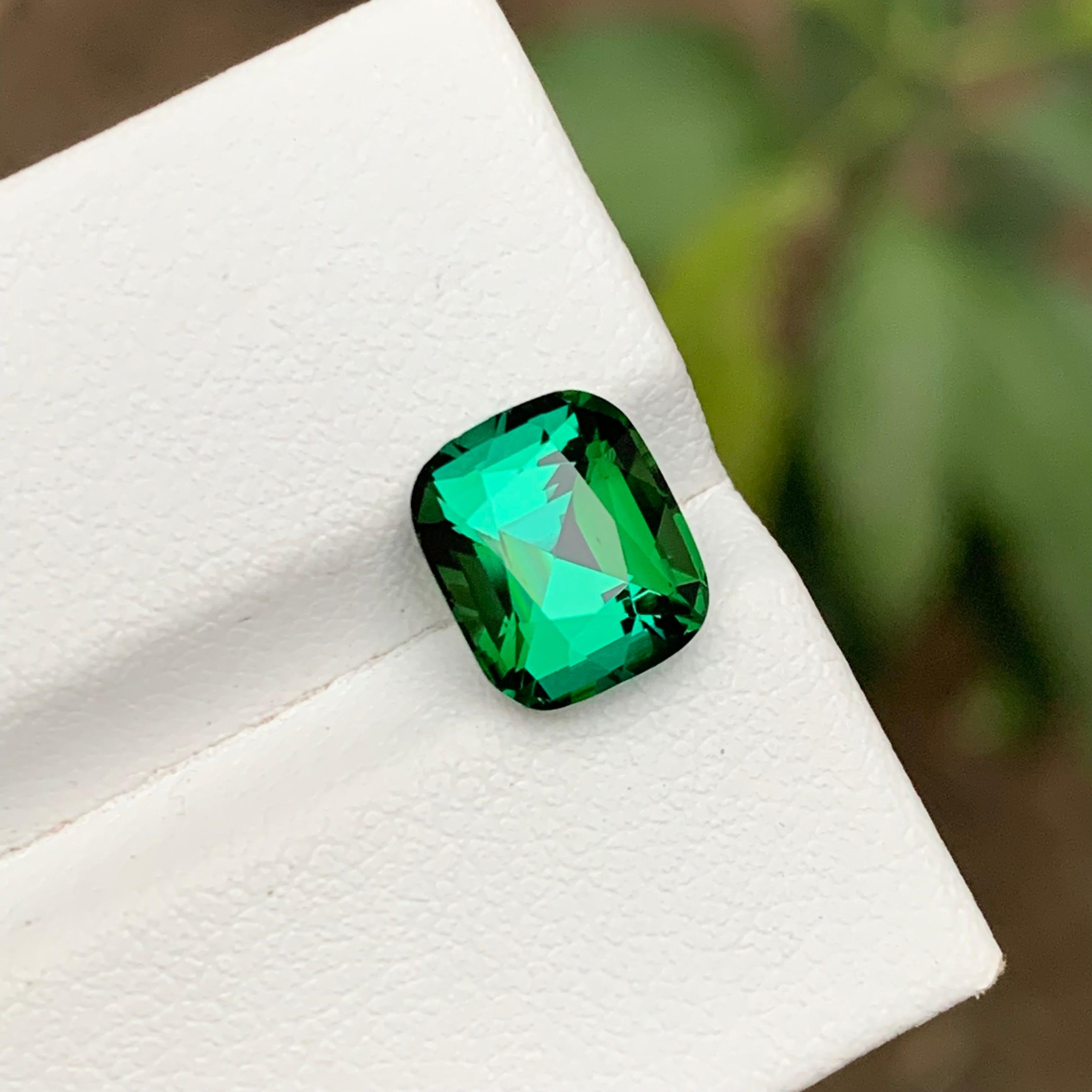 GEMSTONE TYPE: Tourmaline
PIECE(S): 1
WEIGHT: 2.70 Carat
SHAPE: Cushion 
SIZE (MM): 7.66 x 8.98 x 5.90
COLOR: Lagoon Green
CLARITY: Eye Clean
TREATMENT: None
ORIGIN: Afghanistan
CERTIFICATE: On demand

This stunning 2.70 carat natural lagoon green