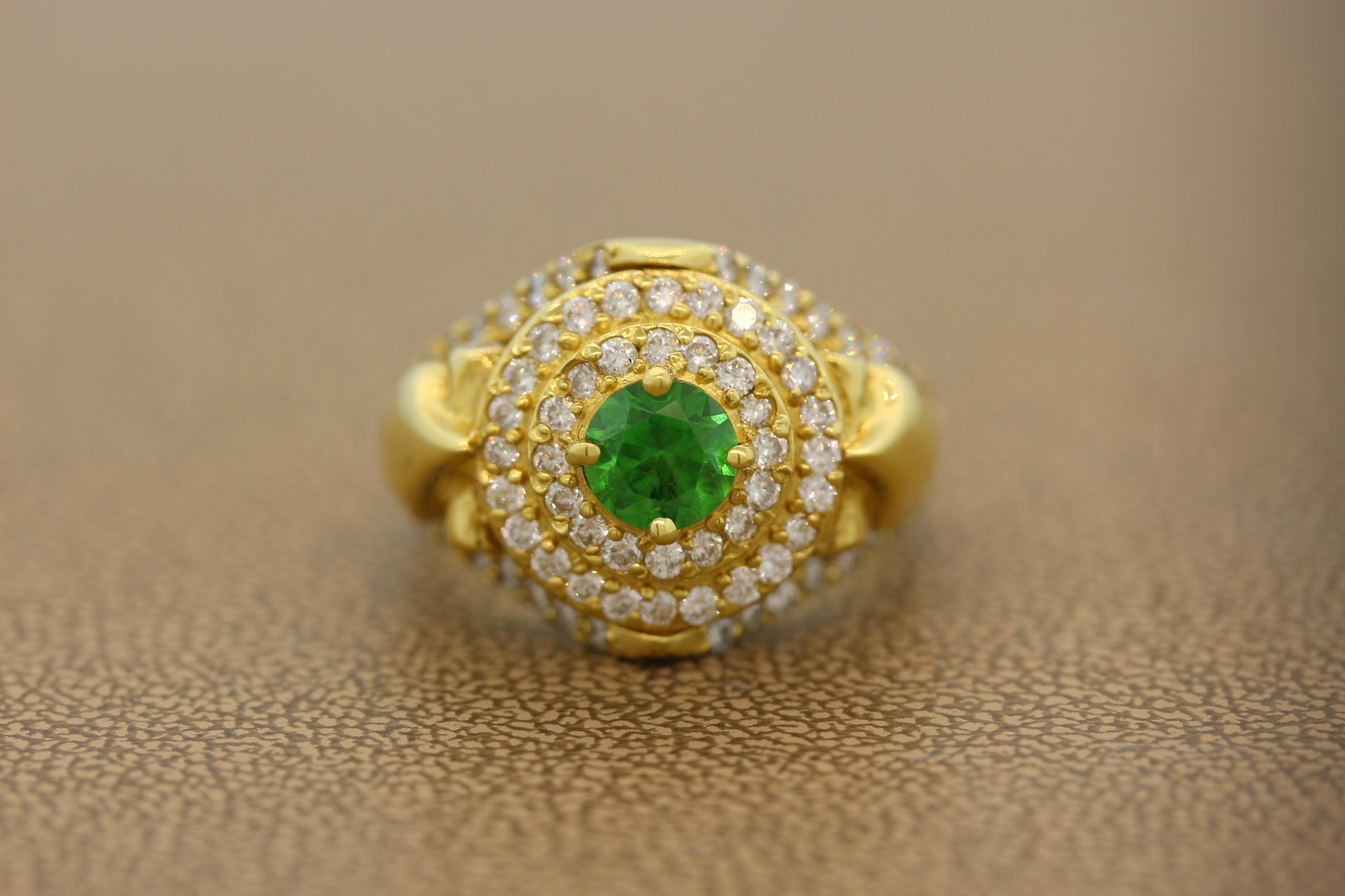 A gorgeous ring featuring an illusive demantoid garnet weighting approximately 1.50 carats. An extremely rare gemstone, this particularly demantoid has a perfect horsetail inclusion in the center of the stone with a vivid green color. The round cut
