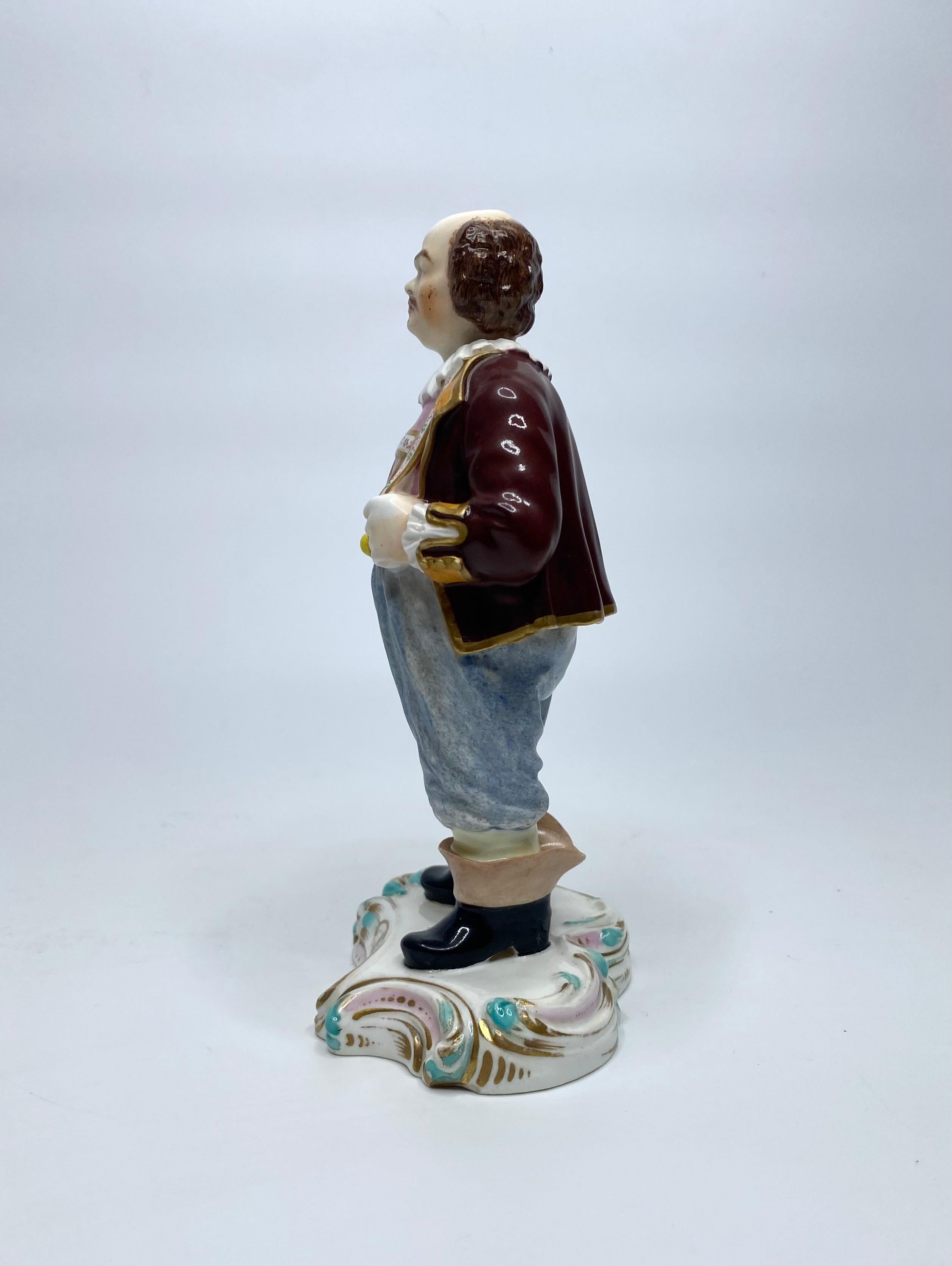 A rare Derby porcelain ‘Nodding’ figure, circa 1840. Modelled after the Meissen original, as ‘Joseph Frölich’, stood, with his thumbs in his braces.
His detachable head, with a brass counterweight, to enable the head to ‘nod’.
Incised model number