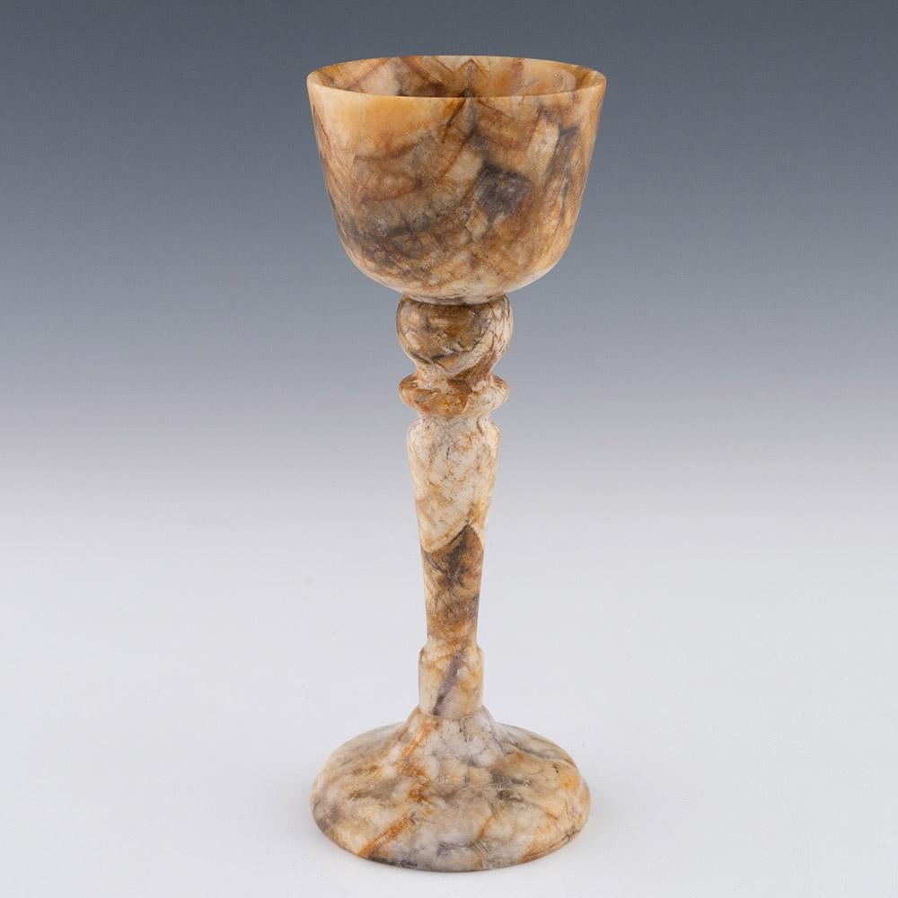 Heading : Rare Derbyshire Fluorspar Chalice – Modern
Date : 21st Century
Period : Elizabeth II / Charles III
Marks : None
Origin : Derbyshire
Colour : Polychrome
Features : Cup shaped bowl with knopped stem and conical foot
Condition : As