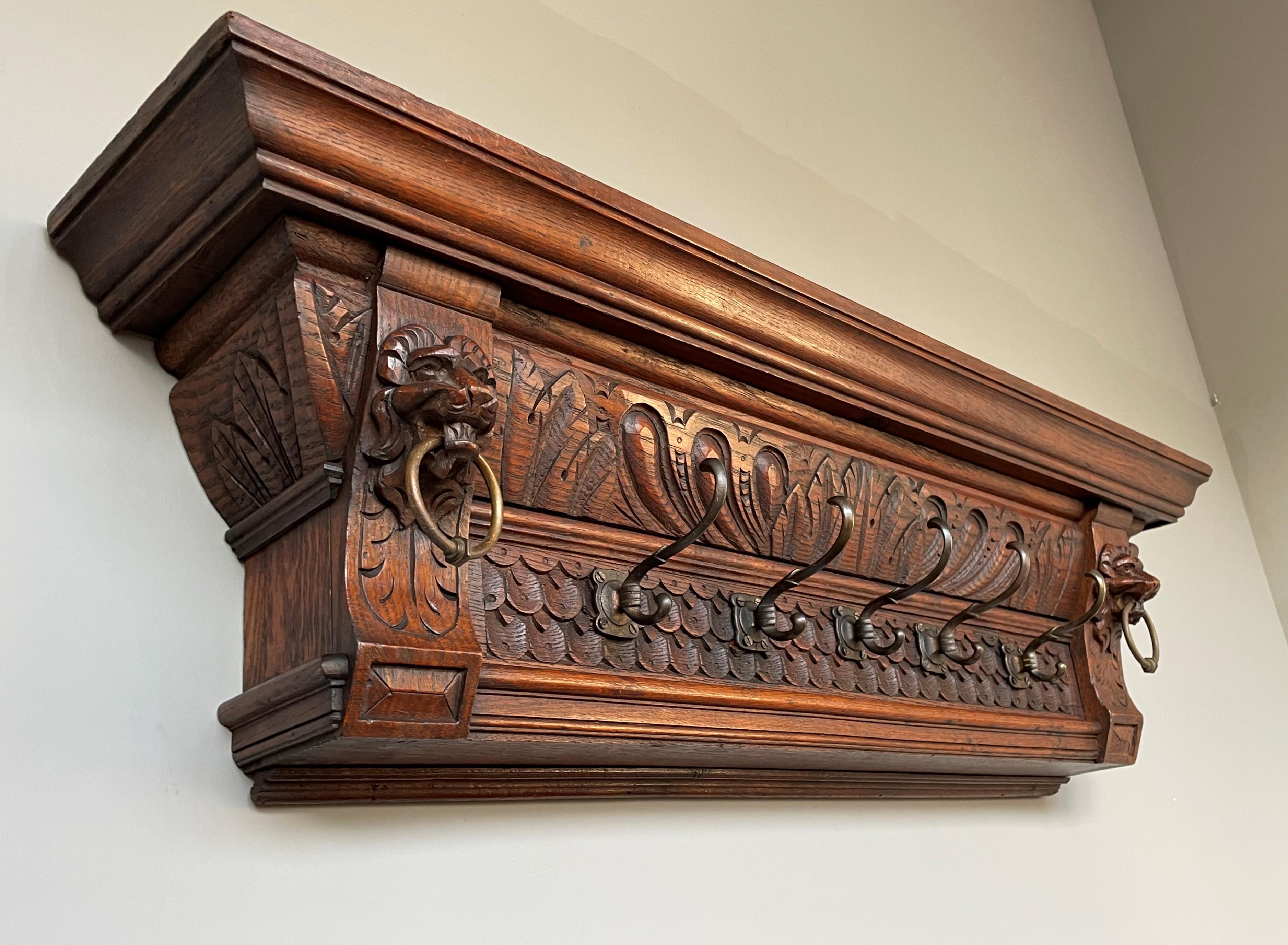 Unuasally deep and very sculptural coat rack with stylish bronzed hooks.

This antique and practical size Dutch coat rack is special and desirable for a number of reasons. First of all, it is very well carved and with great depth. Secondly, we
