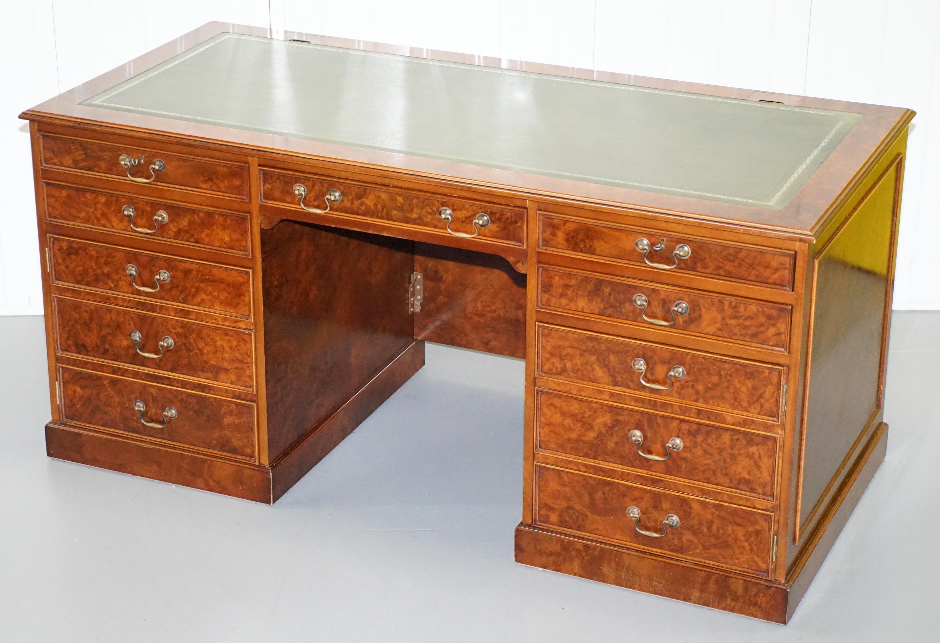 We are delighted to this stunning large luxury premium Burr Walnut twin pedestal partner desk specially designed to house a tower Computer and fully panelled

I have the matching three drawer filing cabinet listed under my other items 

A