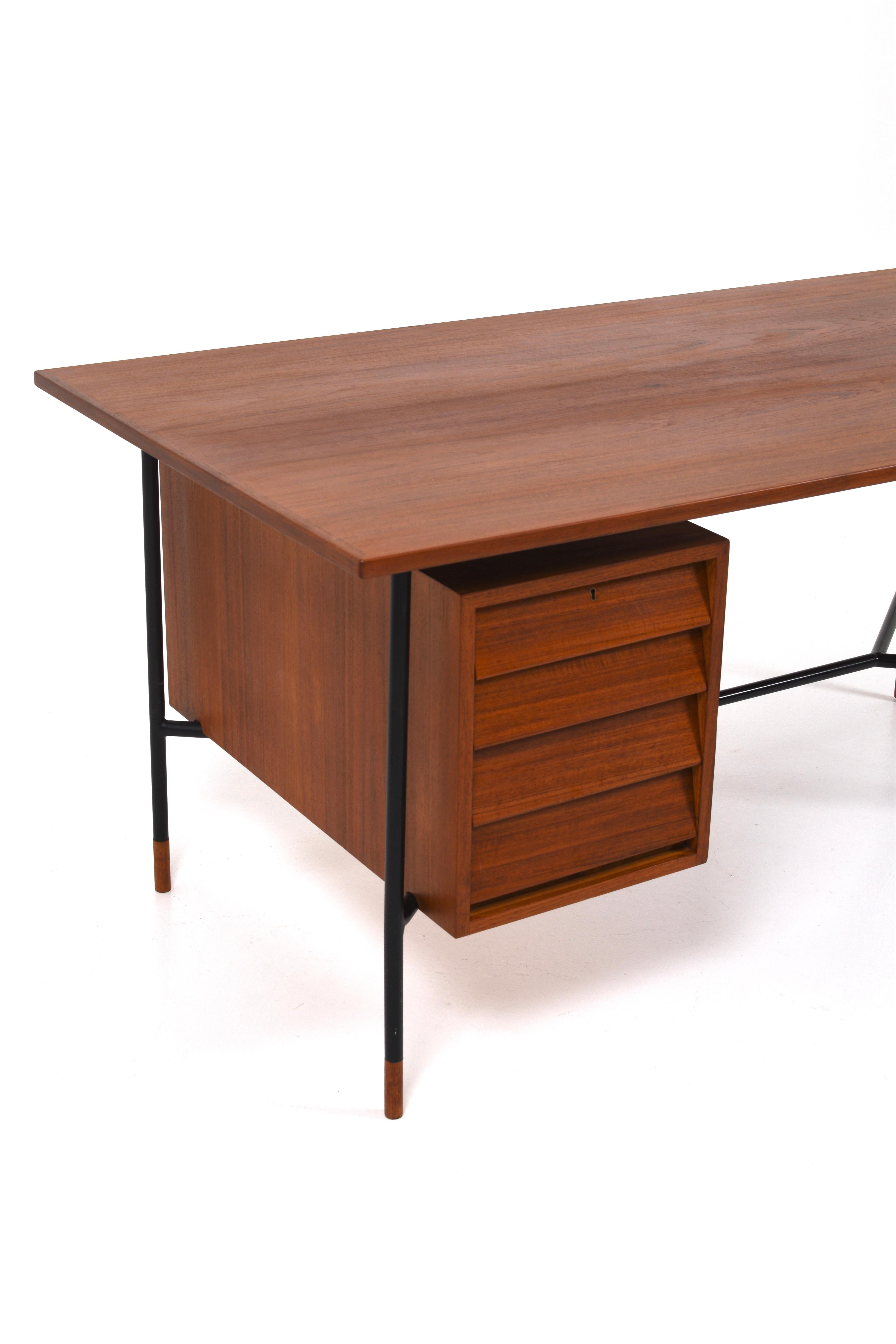 Swedish Rare Desk H-55 by Åke Hassbjer in teak and steel base, 1950s For Sale