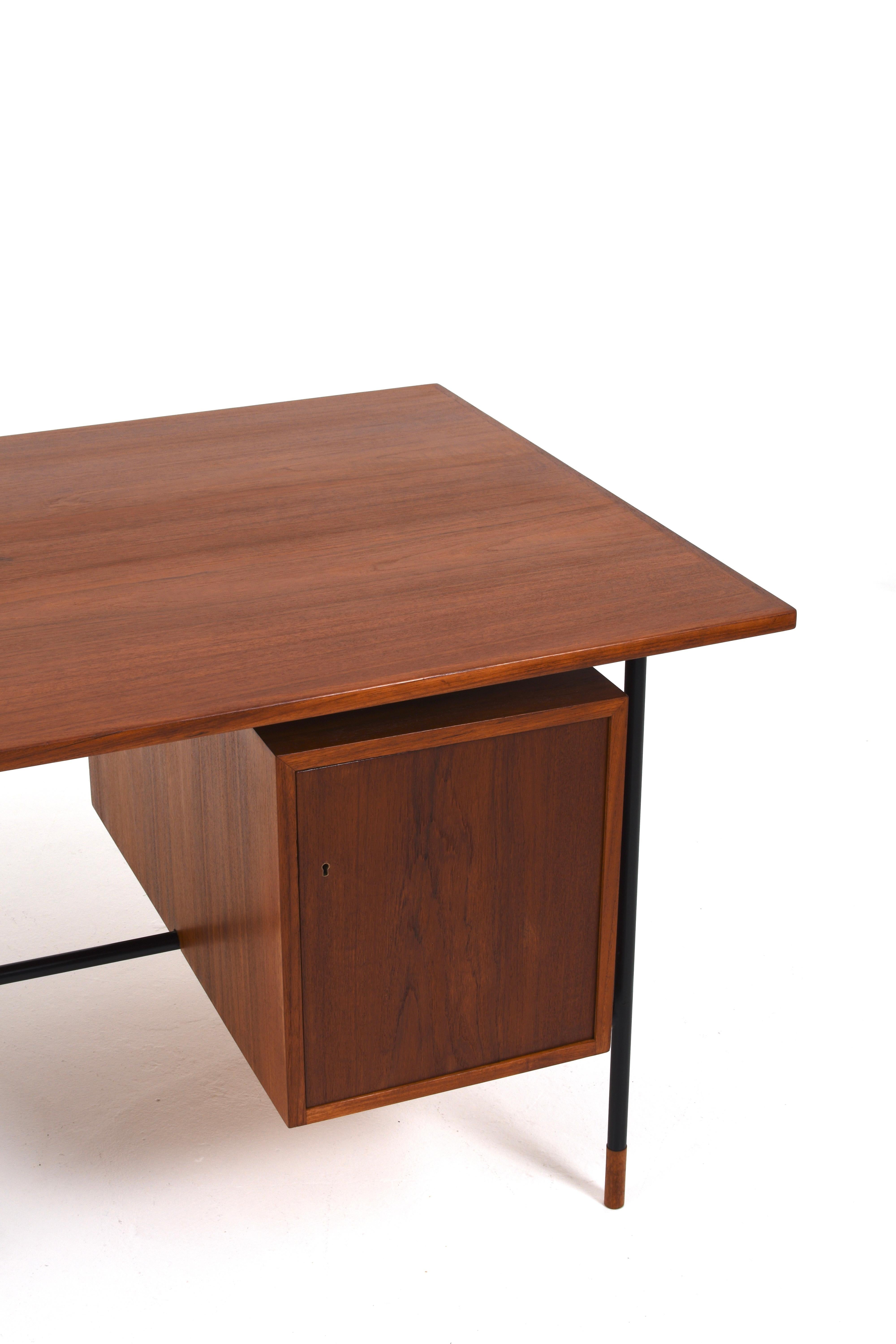 Mid-20th Century Rare Desk H-55 by Åke Hassbjer in teak and steel base, 1950s For Sale