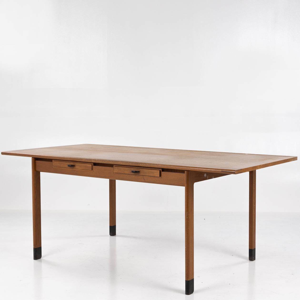 Rare desk in mahogany with two drawers and feet. Designed in 1958 by Vilhelm Wohlert for cabinetmaker Arne Poulsen.

NOTE: Restoration of the desk is included within the price.

