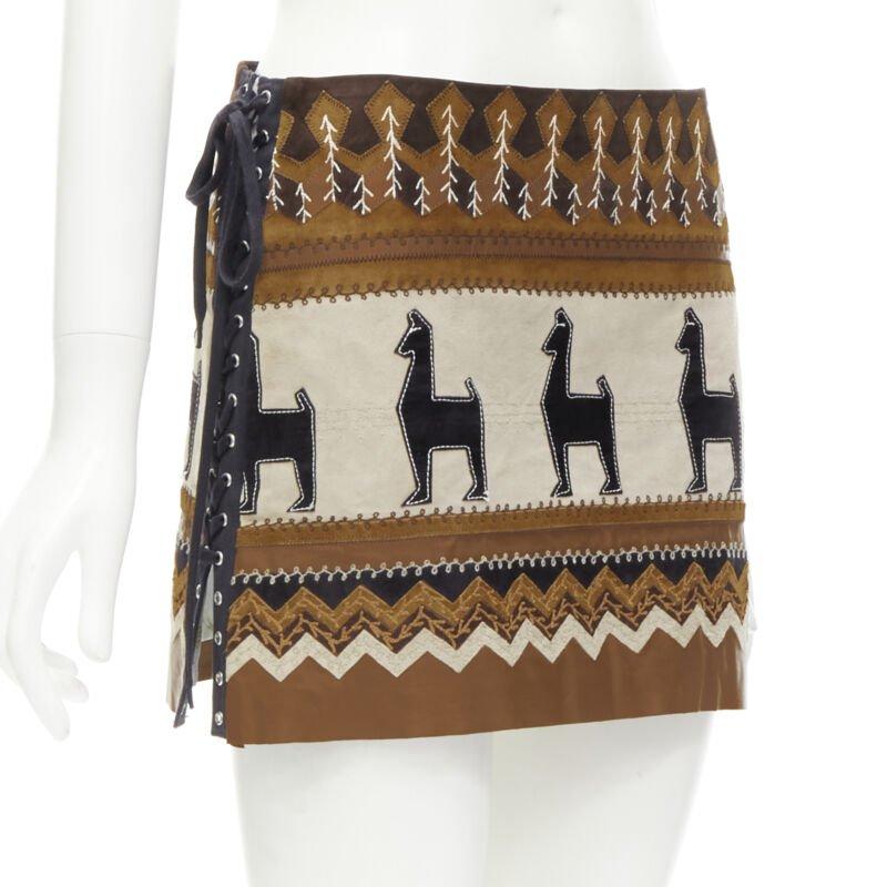rare D&G DOLCE GABANNA Native American aboriginal aztec suede mini skirt S
Reference: ANWU/A00565
Brand: D&G
Designer: Domenico Dolce and Stefano Gabbana
Material: Suede
Color: Brown
Pattern: Ethnic
Closure: Lace Up
Lining:  Fully Lined
Extra