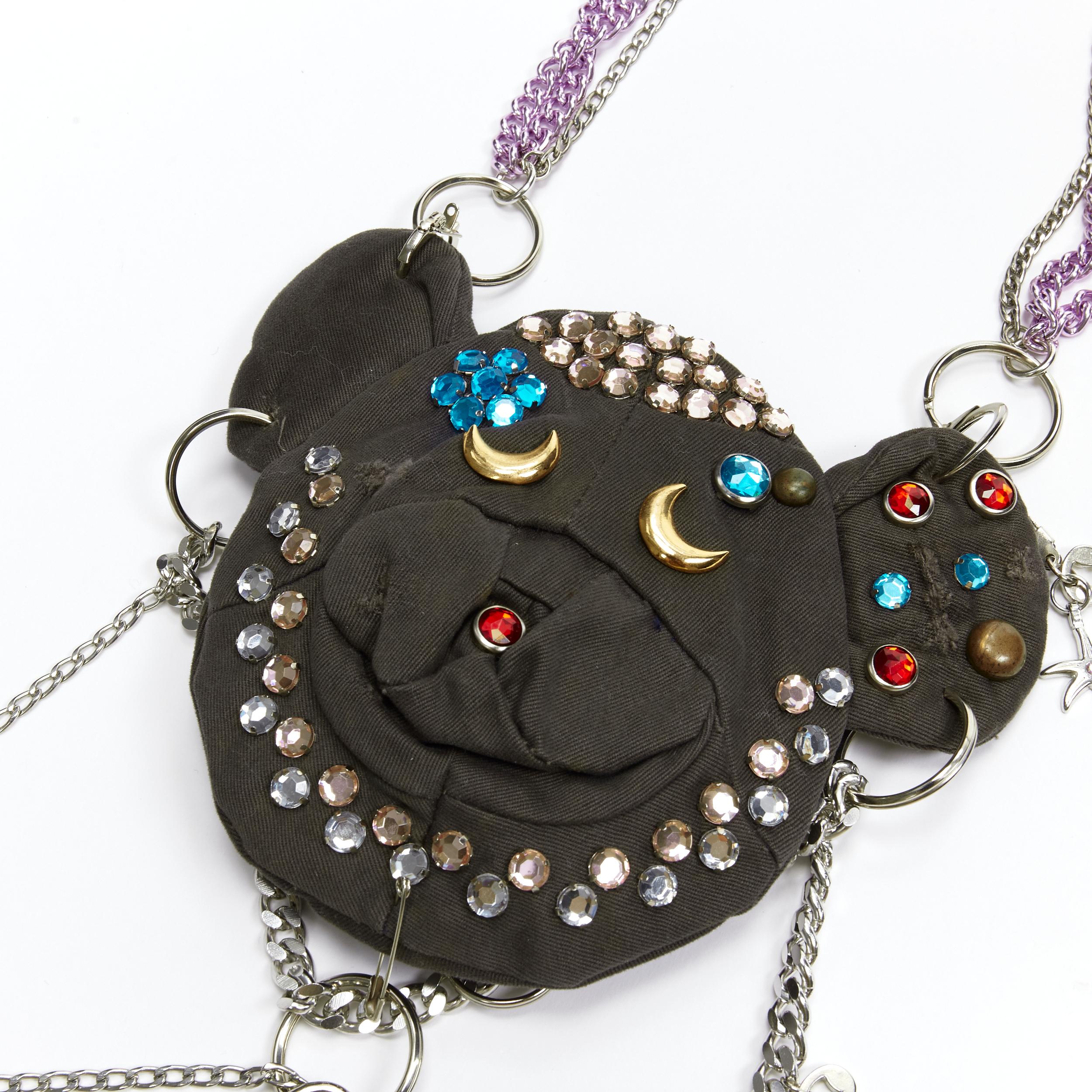 rare D&G DOLCE GABBANA Vintage brown distressed rhinestone chain bear pouch bag
Brand: D&G
Designer: Domenico Dolce and Stefano Gabbana
Material: Cotton
Color: Brown
Pattern: Solid
Closure: Zip
Extra Detail: Distressed brown cotton. Rhinestone