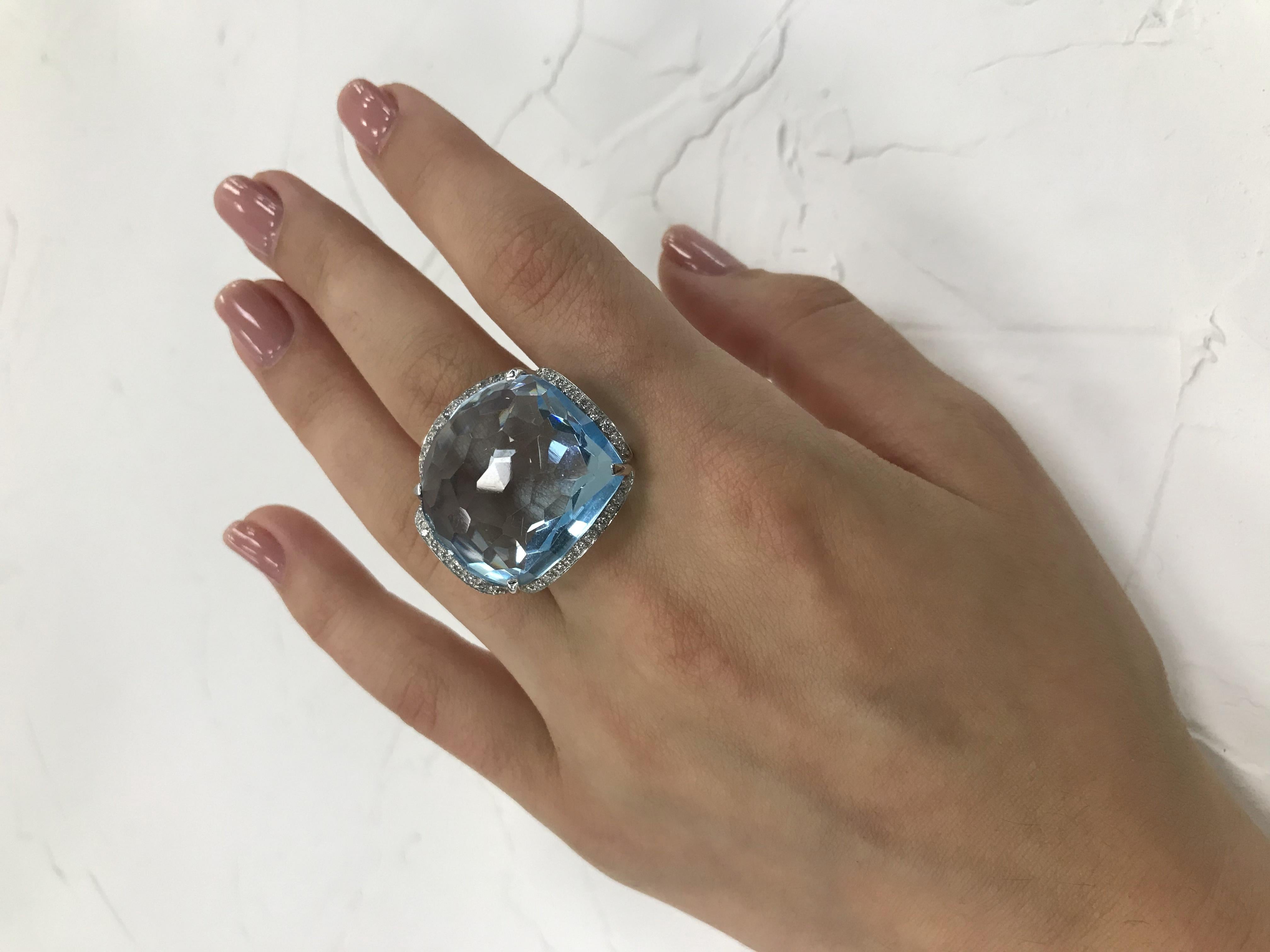 Ring Gold 18 K 
Diamond 40-Round-0,4ct-3/6A 
Topaz 1-43,5 ct  13,58
Weight 22,36
Size 16.5

With a heritage of ancient fine Swiss jewelry traditions, NATKINA is a Geneva based jewellery brand, which creates modern jewellery masterpieces suitable for
