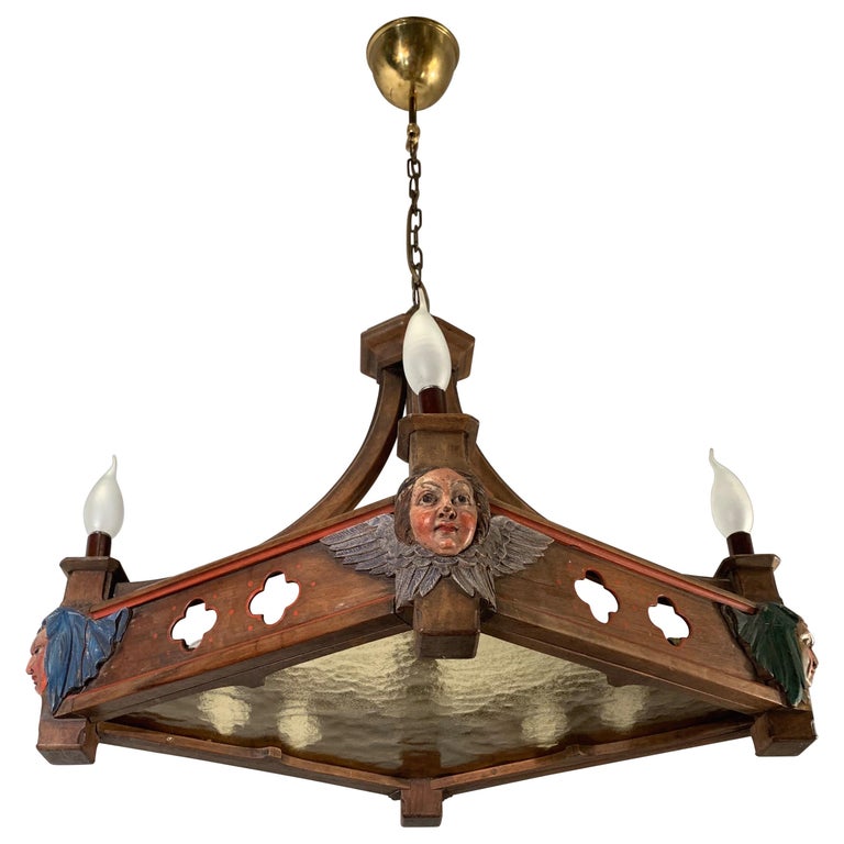 Rare Diamond Shape, Gothic Style Chandelier, Carved Theatrical Mask Sculptures For Sale