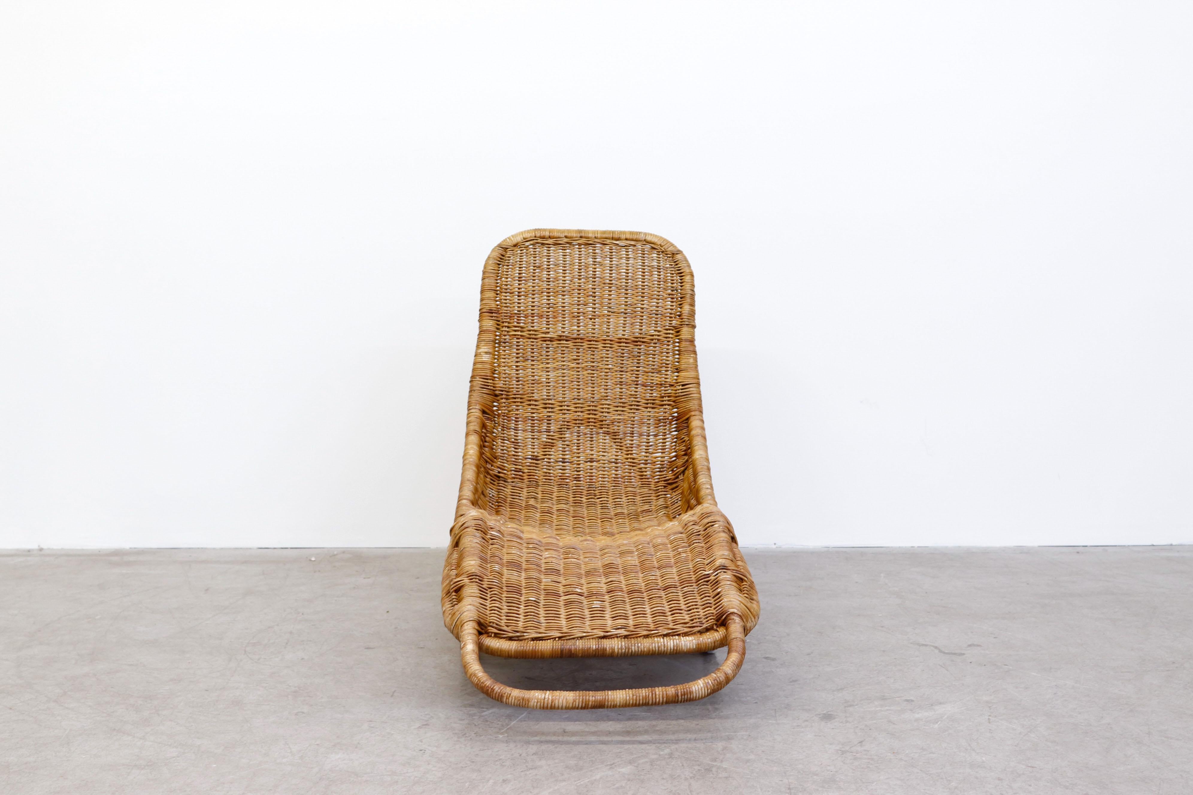 Rare mid-century Dirk Van Sliedregt woven rattan chaise with sled base. In original condition with nice patina and visible wear. Wear is consistent with it's age and use.