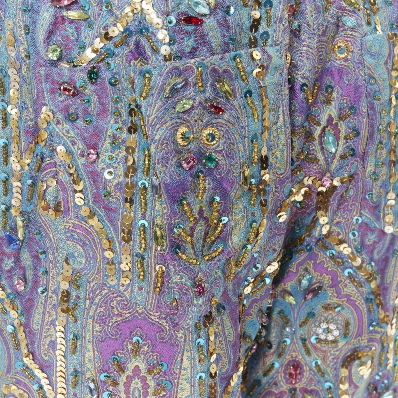 rare DOLCE GABBANA 2000 blue purple iridescent jewel embellished pants M
Reference: GIYG/A00028
Brand: Dolce Gabbana
Designer: Domenico Dolce and Stefano Gabbana
Model: Embellished pants
Collection: Spring Summer 2000 - Runway
Material:
