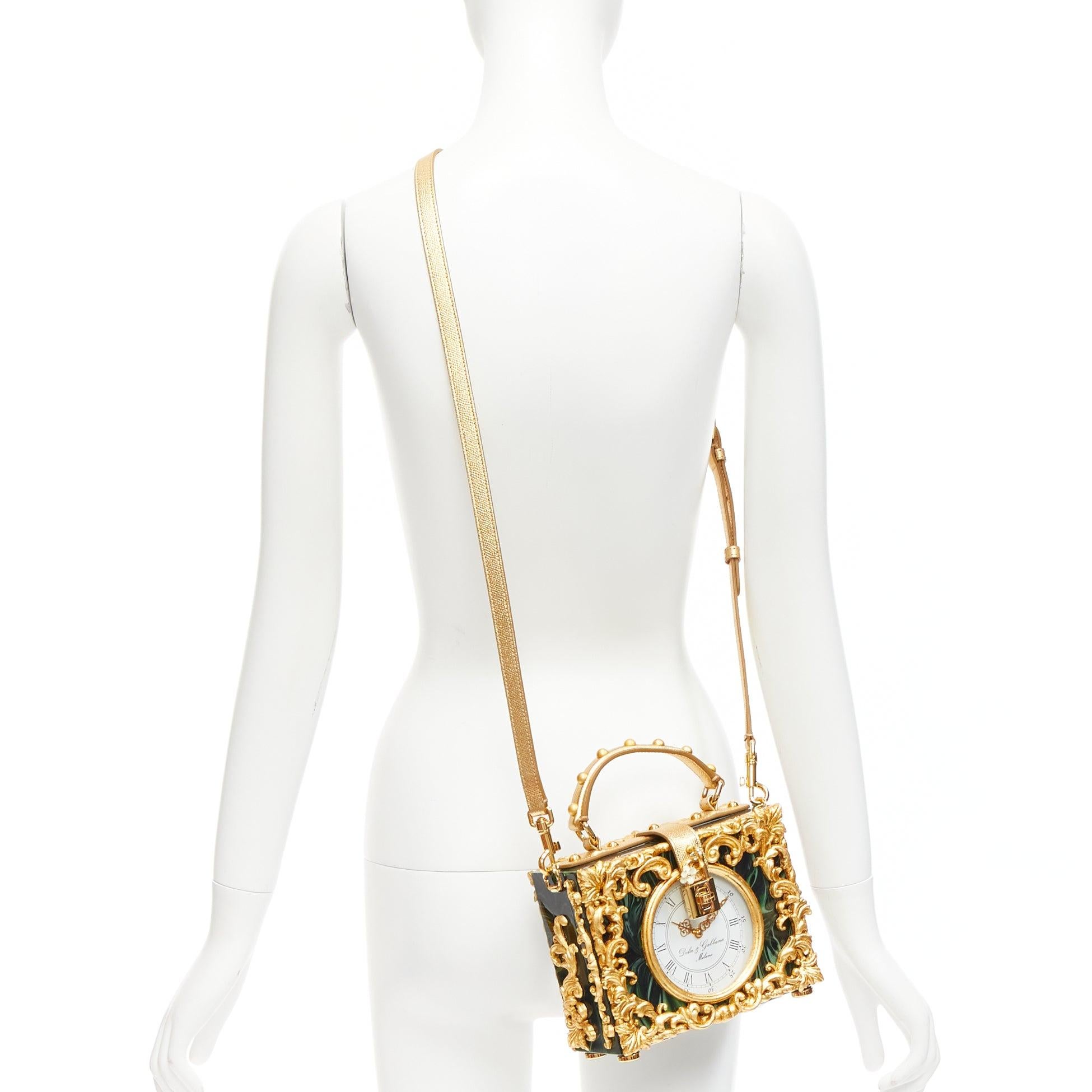 rare DOLCE GABBANA Box Orologio Barocco gold metal green marble resin vanity bag
Reference: TGAS/D01025
Brand: Dolce Gabbana
Designer: Domenico Dolce and Stefano Gabbana
Model: Box Orologio Barocco
Material: Acetate, Metal, Leather
Color: Green,