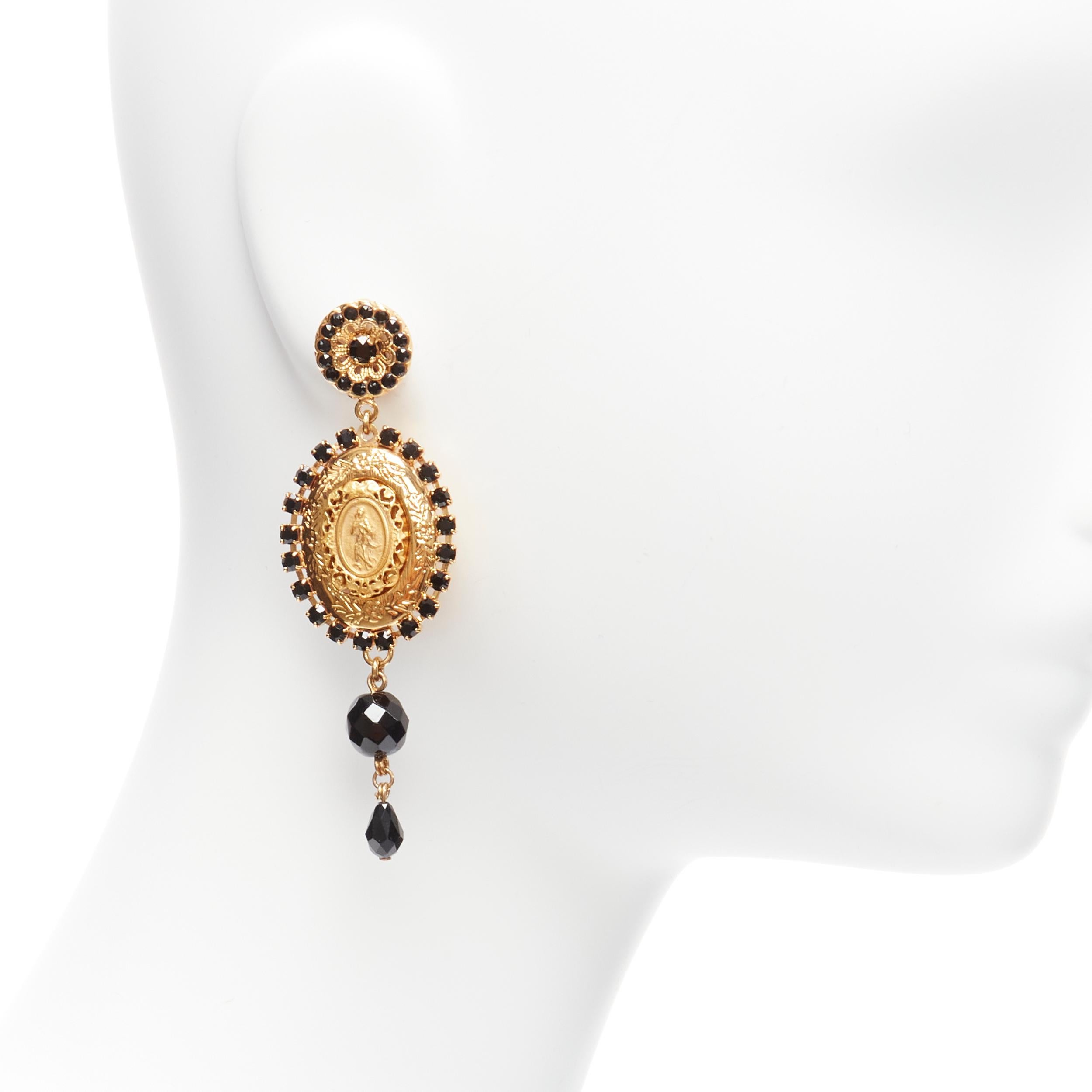 rare DOLCE GABBANA gold black crystal Religious medallion coin drop clip earrings
Reference: TGAS/D00186
Brand: Dolce Gabbana
Designer: Domenico Dolce and Stefano Gabbana
Material: Metal, Plastic
Color: Gold, Black
Pattern: Solid
Closure: Clip