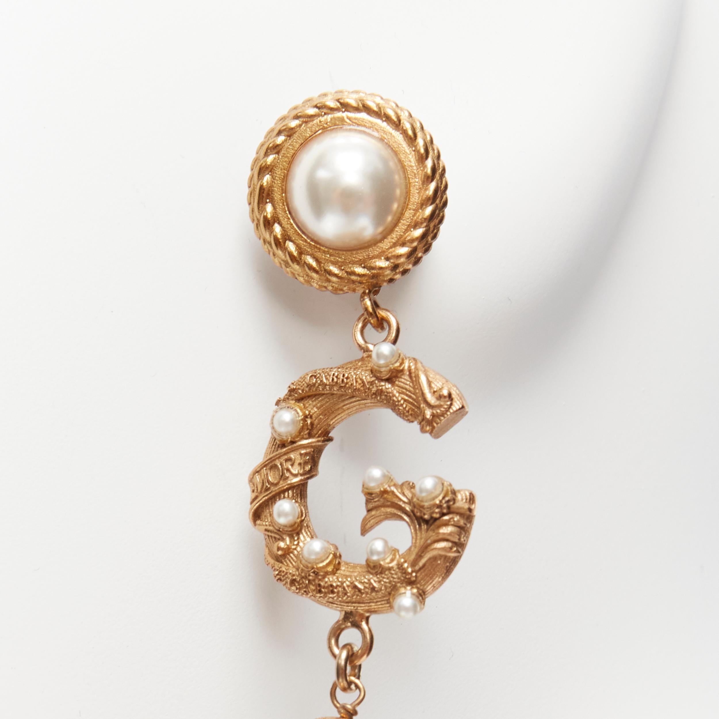 Women's rare DOLCE GABBANA gold tone DG logo baroque pearl tiered drop clip earrings For Sale