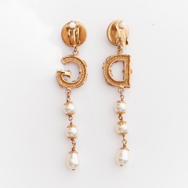 rare DOLCE GABBANA gold tone DG logo baroque pearl tiered drop clip earrings  For Sale at 1stDibs