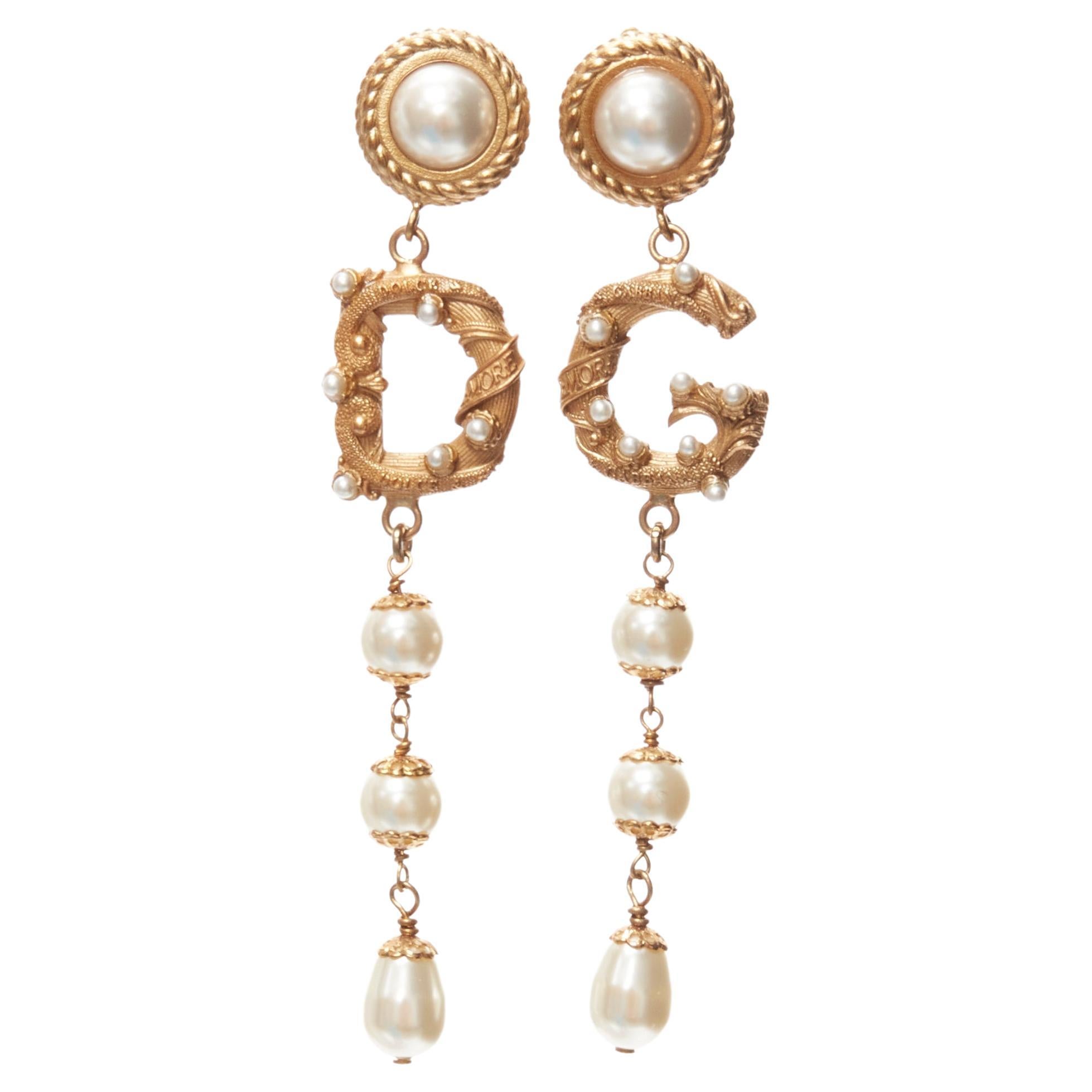rare DOLCE GABBANA gold tone DG logo baroque pearl tiered drop clip earrings For Sale