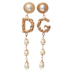 rare DOLCE GABBANA gold tone DG logo baroque pearl tiered drop clip earrings