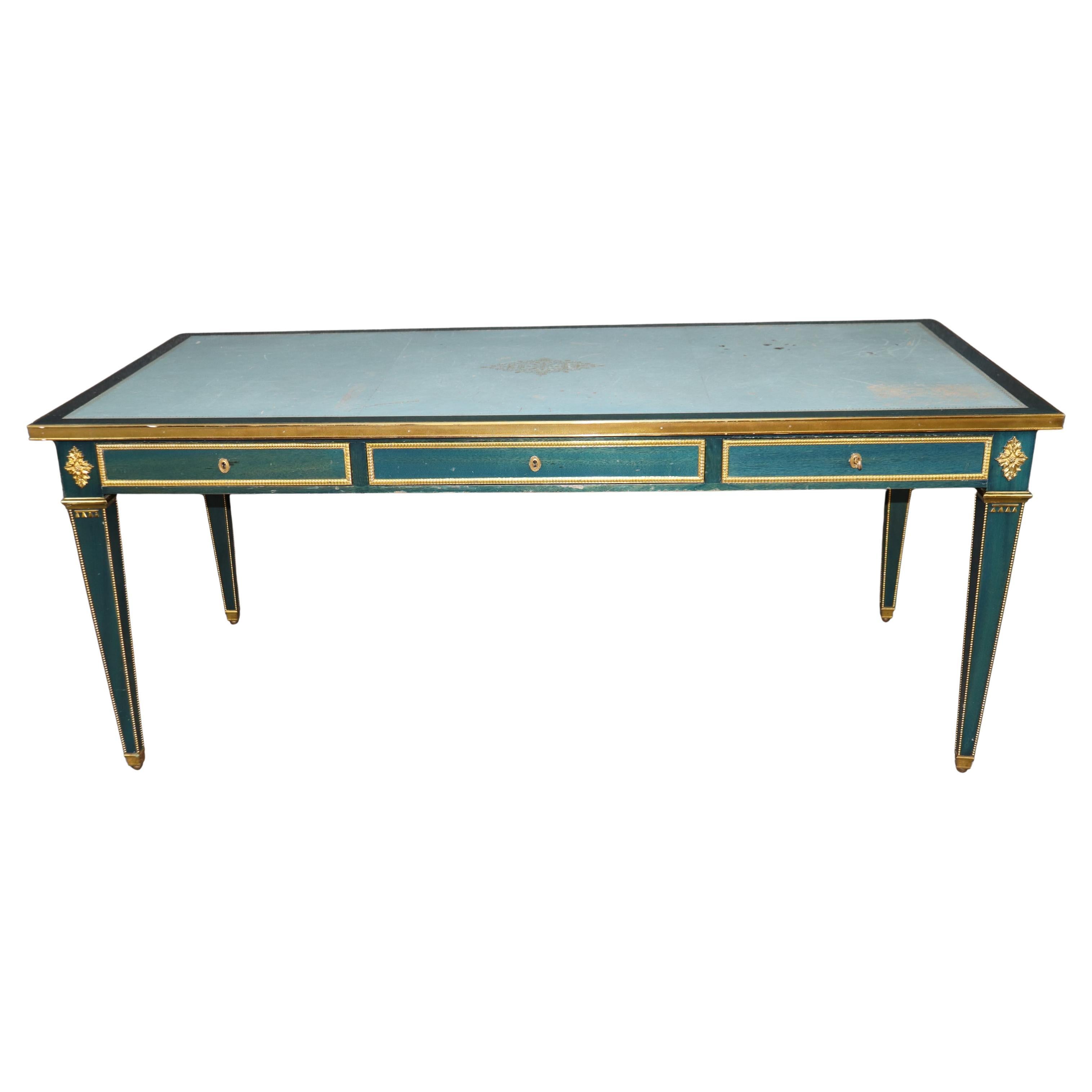 Bureau Plat de la Maison Jansen en cuir bleu-vert monté sur bronze