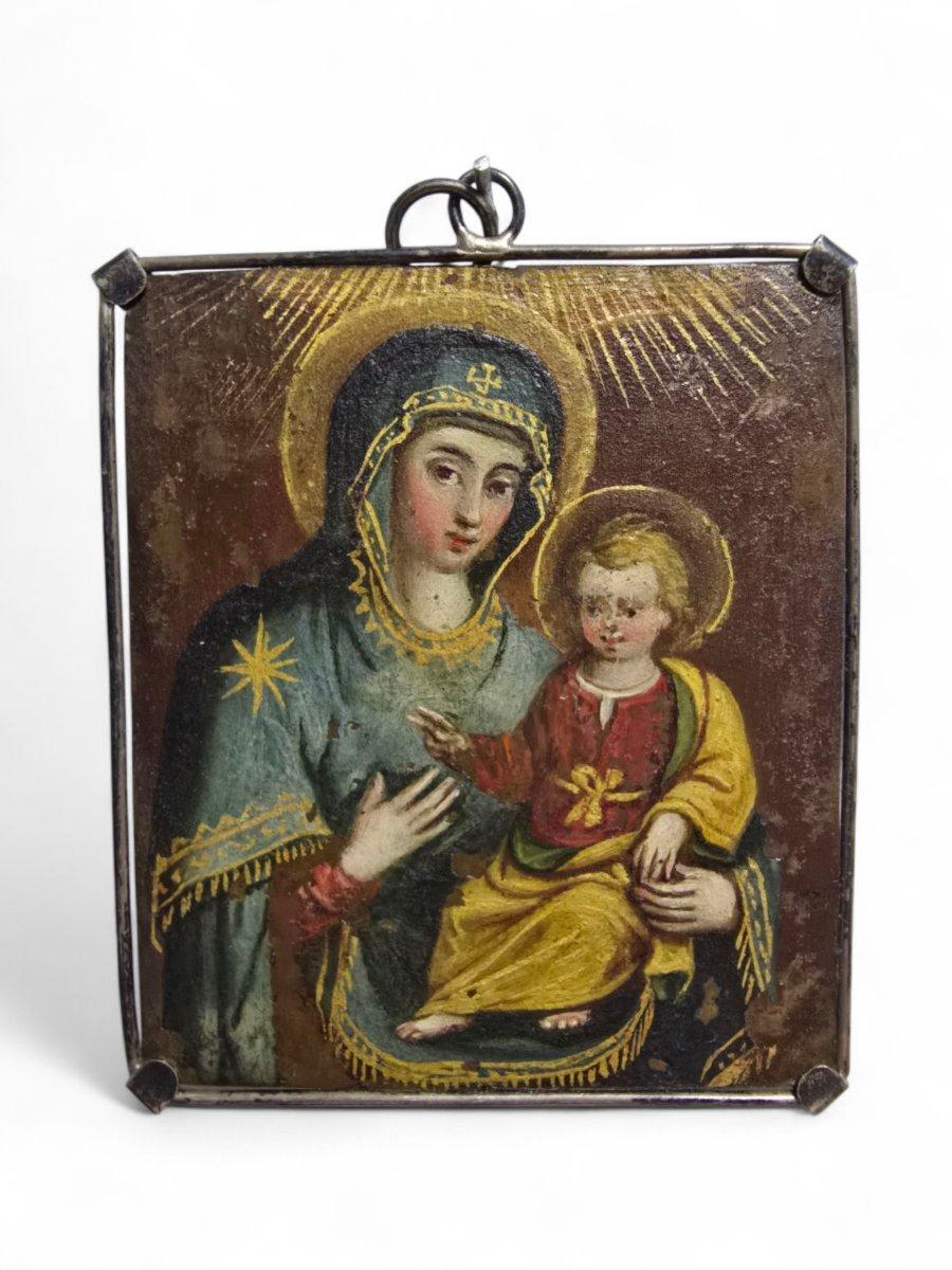 Raro dittico religioso bifronte - San Nicola da Tolentino & Vergine con Bambino - Olio su rame, XVII secolo, montatura in argento

Una preziosa e rara opera del XVII secolo, dipinta a olio su una sottile lastra di rame su entrambi i lati, che