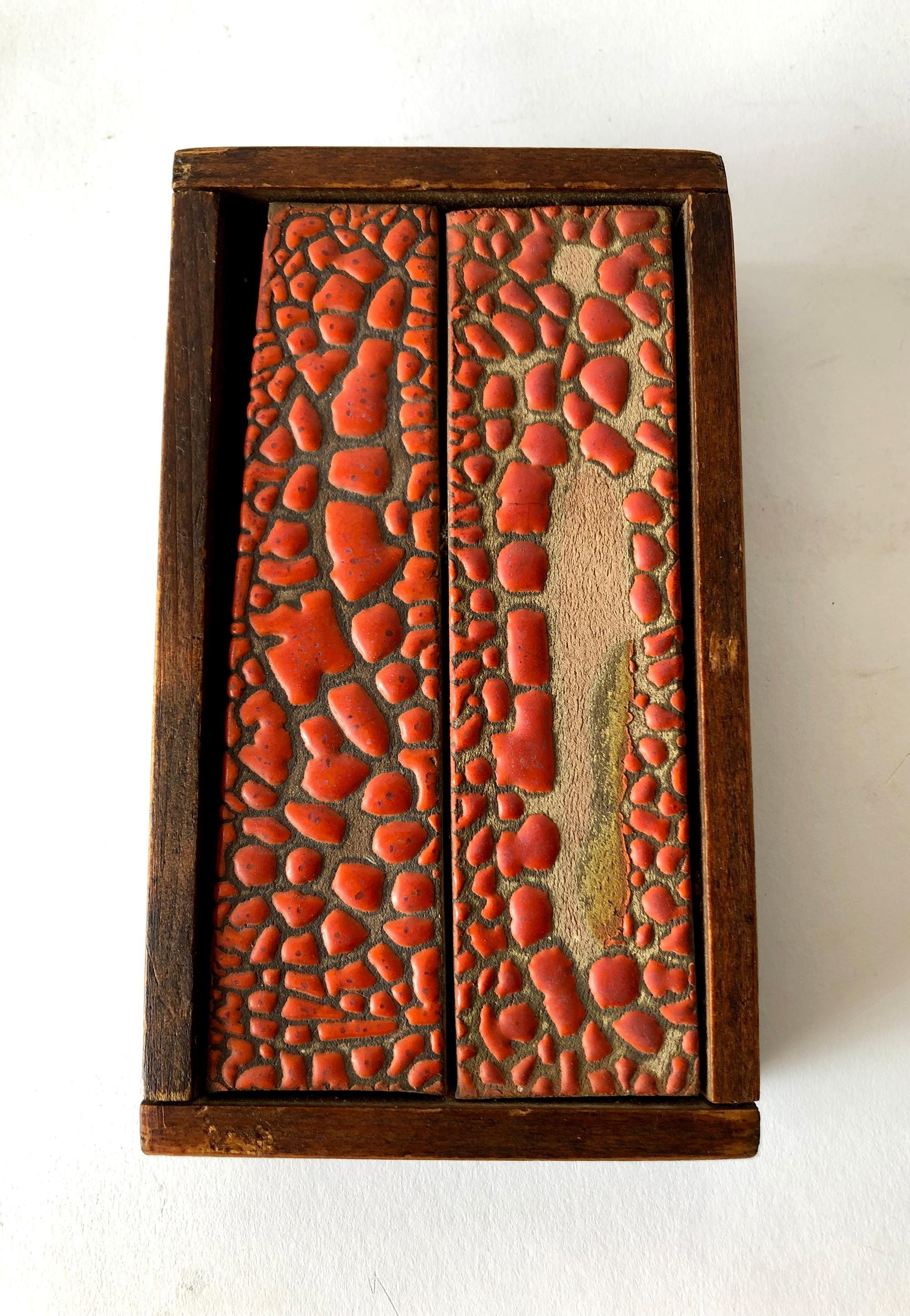 Rare, historical example of two tiles framed in redwood, created and hand signed by ceramist and sculptor Doyle Lane. Painting measures 7