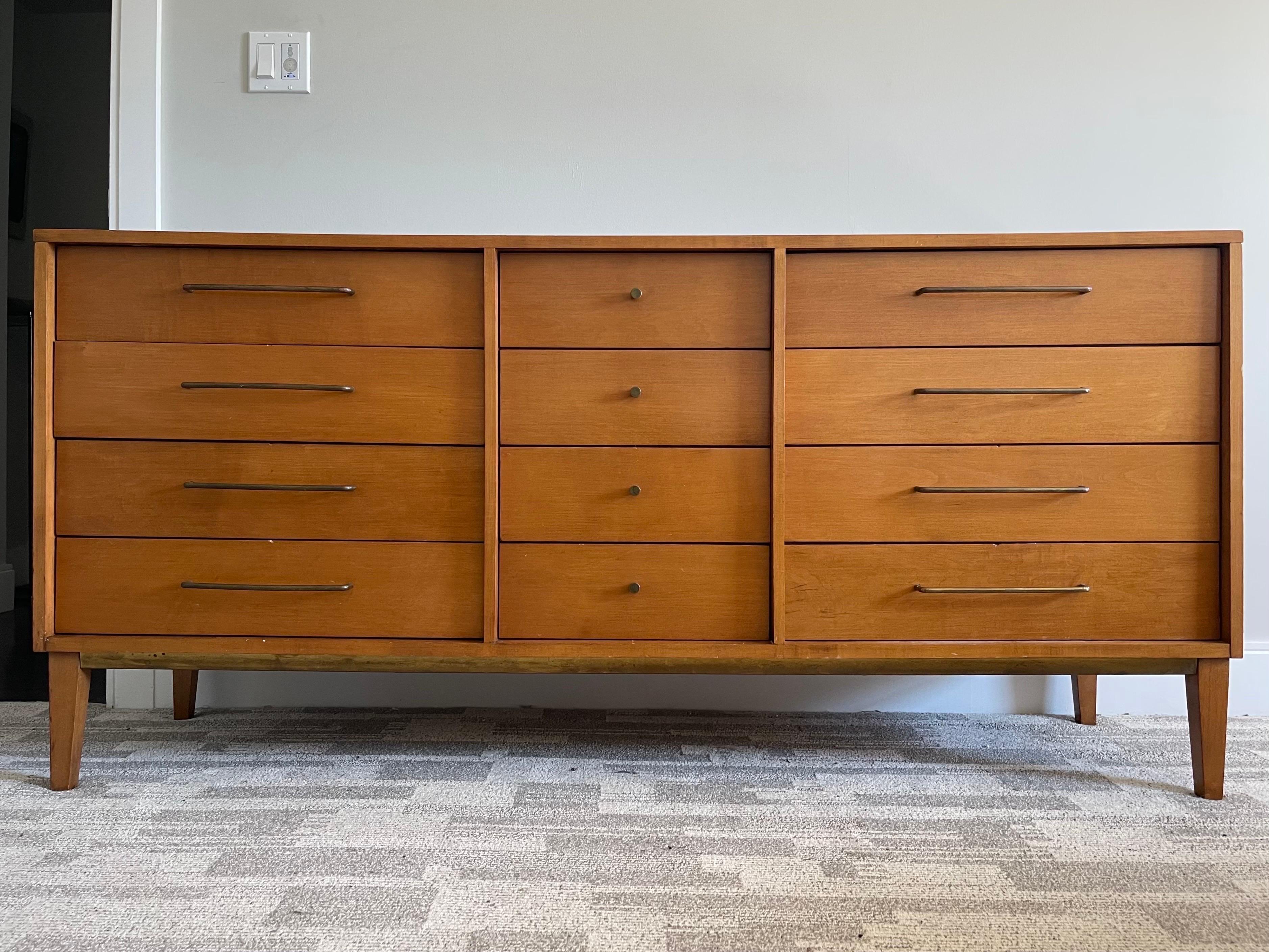 Rare early maple dresser by Milo Baughman for Murray Furniture. Solid Wood. Brass pulls and lowlight details under the outside collar. Patina and wear are just the right amount. 
66 x 31 x 18