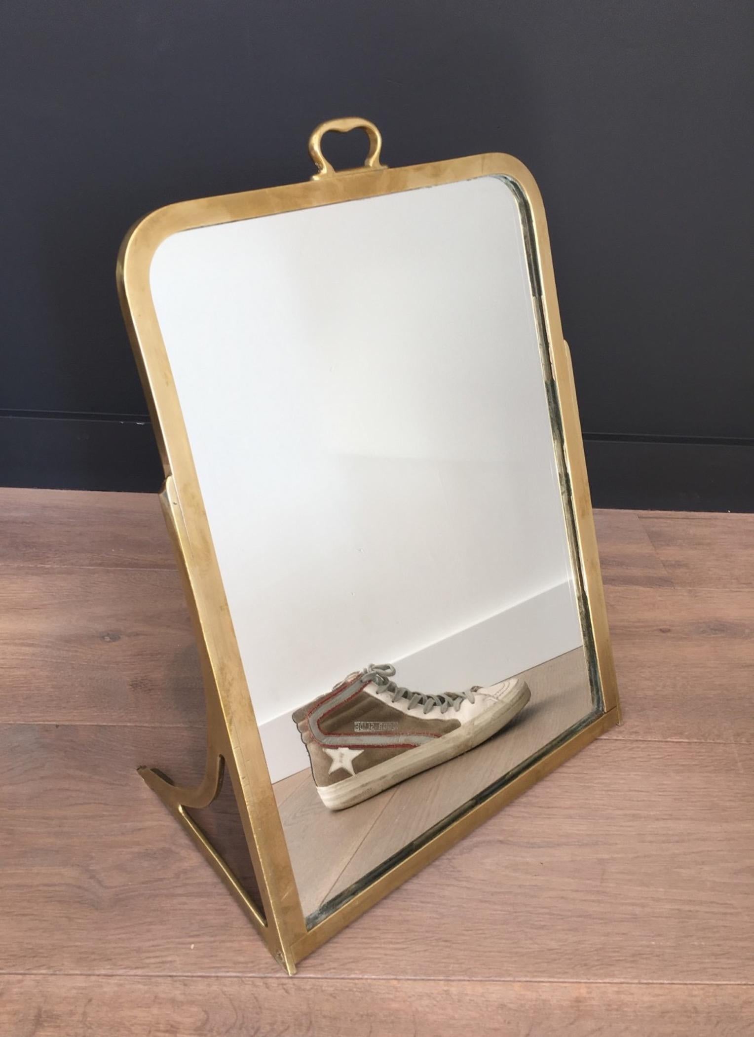This dressing shoe mirror is made of brass. This is a rare piece, made in France, circa 1900.