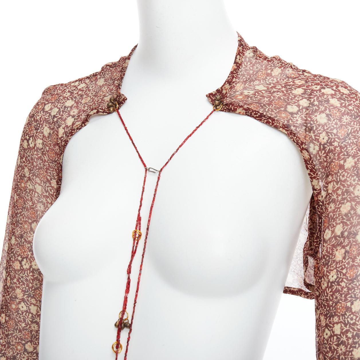 rare DRIES VAN NOTEN Vintage 90s brown 100% silk ethnic fur charm floral crop top FR36 S
Reference: TGAS/E00060
Brand: Dries Van Noten
Collection: 1990's
Material: Silk
Color: Brown, Red
Pattern: Floral
Closure: Hook & Bar
Extra Details: Hook and