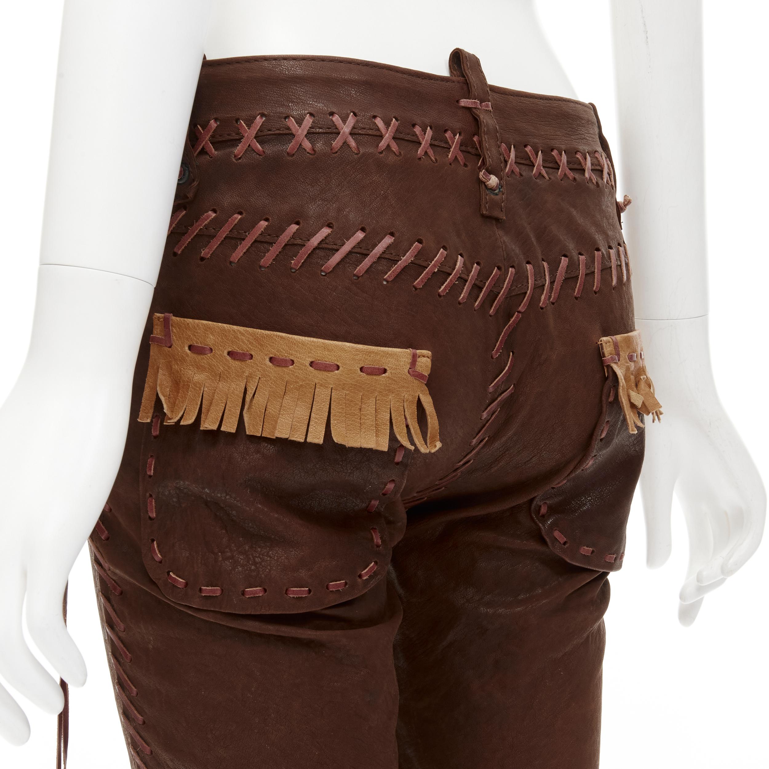 rare DSQUARED2 2005 Native American brown leather whipstitched pants IT38 S 
Reference: ANWU/A00566 
Brand: Dsquared 
Material: Leather 
Color: Brown 
Pattern: Solid 
Closure: Button 
Extra Detail: Concealed button fly. Native American inspired
