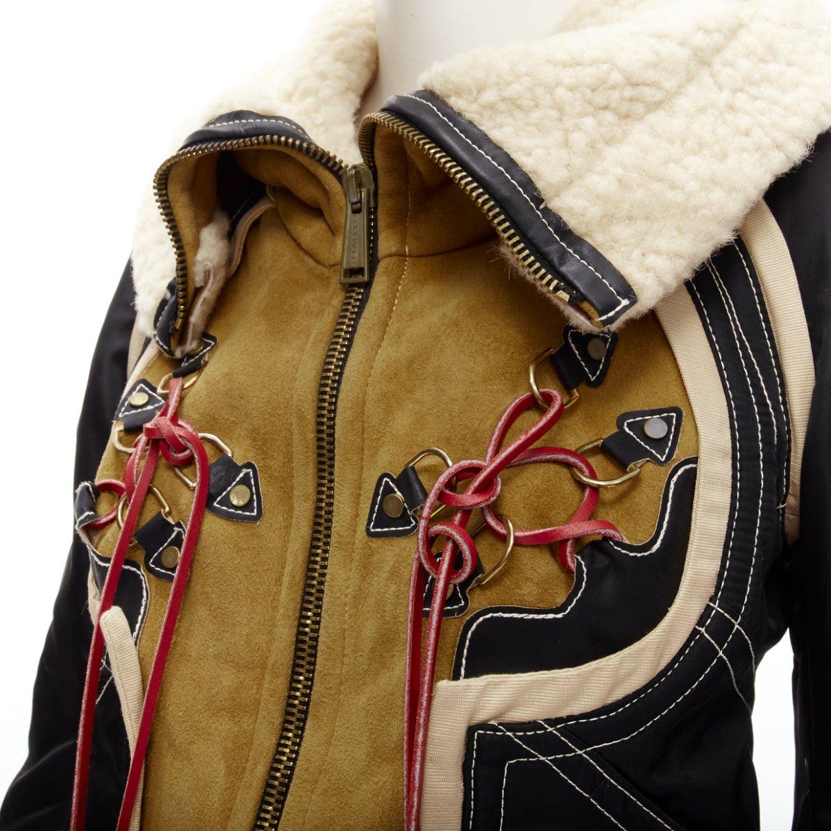 rare DSQUARED2 Vintage Runway brown suede shearling nylon aviator jacket IT40 S
Reference: ANWU/A00744
Brand: Dsquared2
Collection: Runway
Material: Shearling, Nylon
Color: Brown, Black
Pattern: Solid
Closure: Zip
Extra Details: Deconstructed