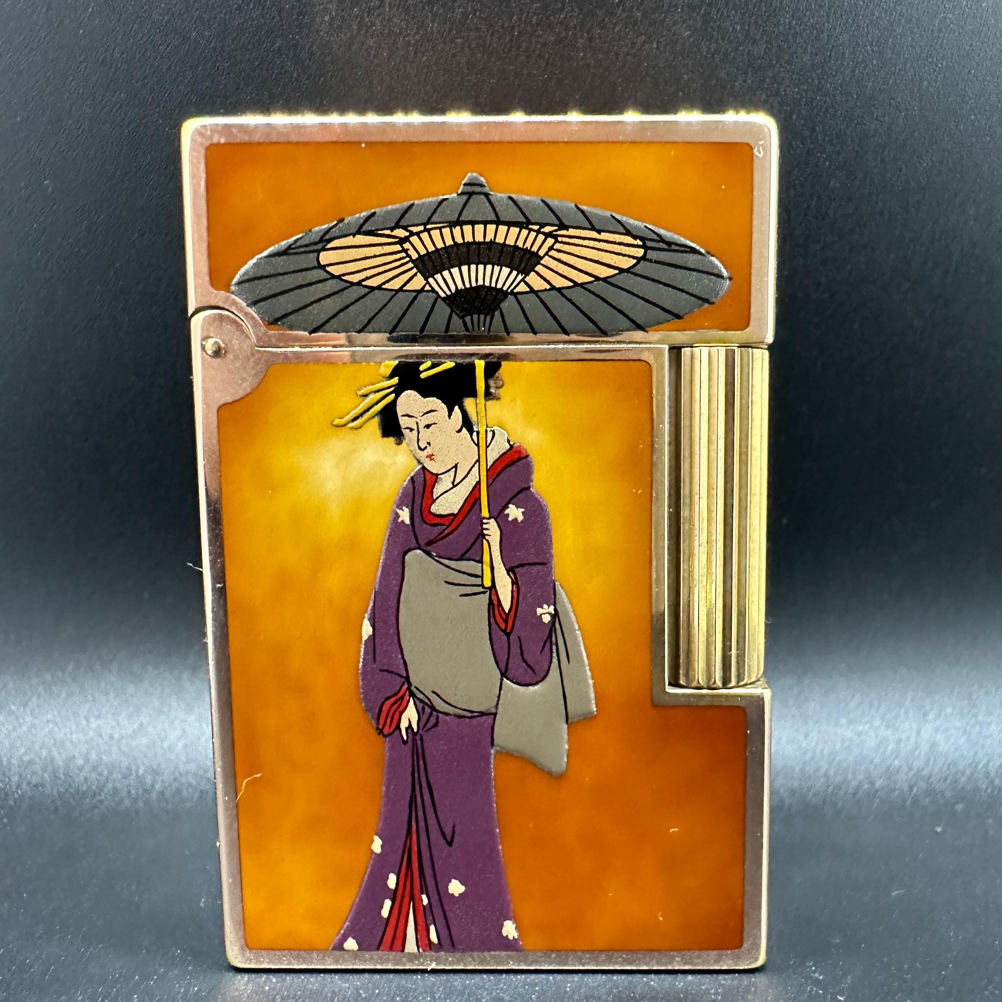 Dupont MAKI-E - The “Geisha” Gold Plated and Chinese lacquer Lighter 
Dupont Maki-E (蒔絵,
Rare - COLLECTIBLE 
Work of art
One of the most in demand  DUPONT LIGHTER 
IN EXCELLENT CONDITION AND WORKING PERFECTLY.
AUTHENTIC 
NO BOX OR PAPERS.
All