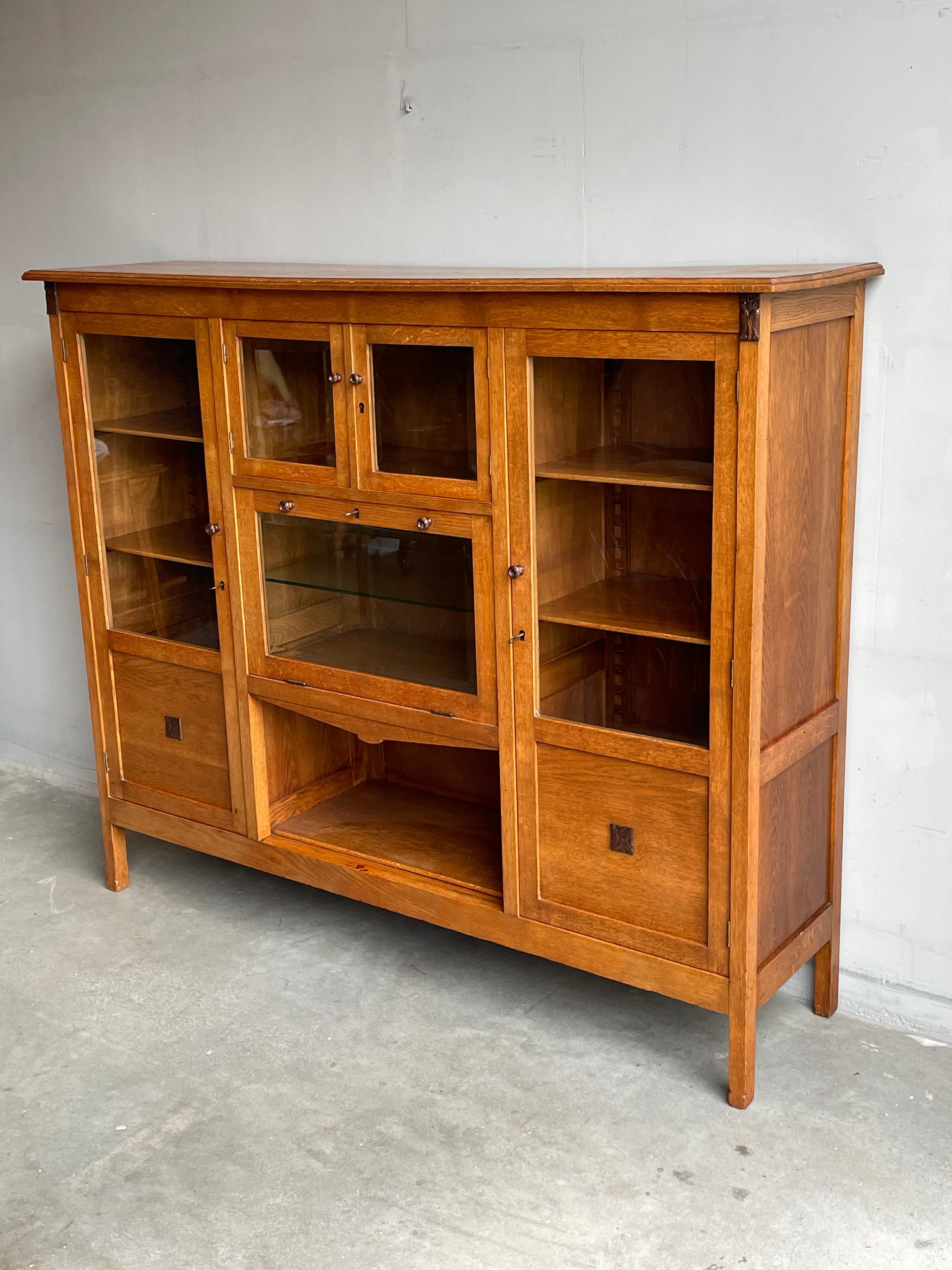 Good size and highly stylish antique bookcase with all working locks and keys.

When it comes to antique furniture, historically, bookcases are the most sought after in the world. The Dutch Arts and Crafts style is unique in its own right and it is