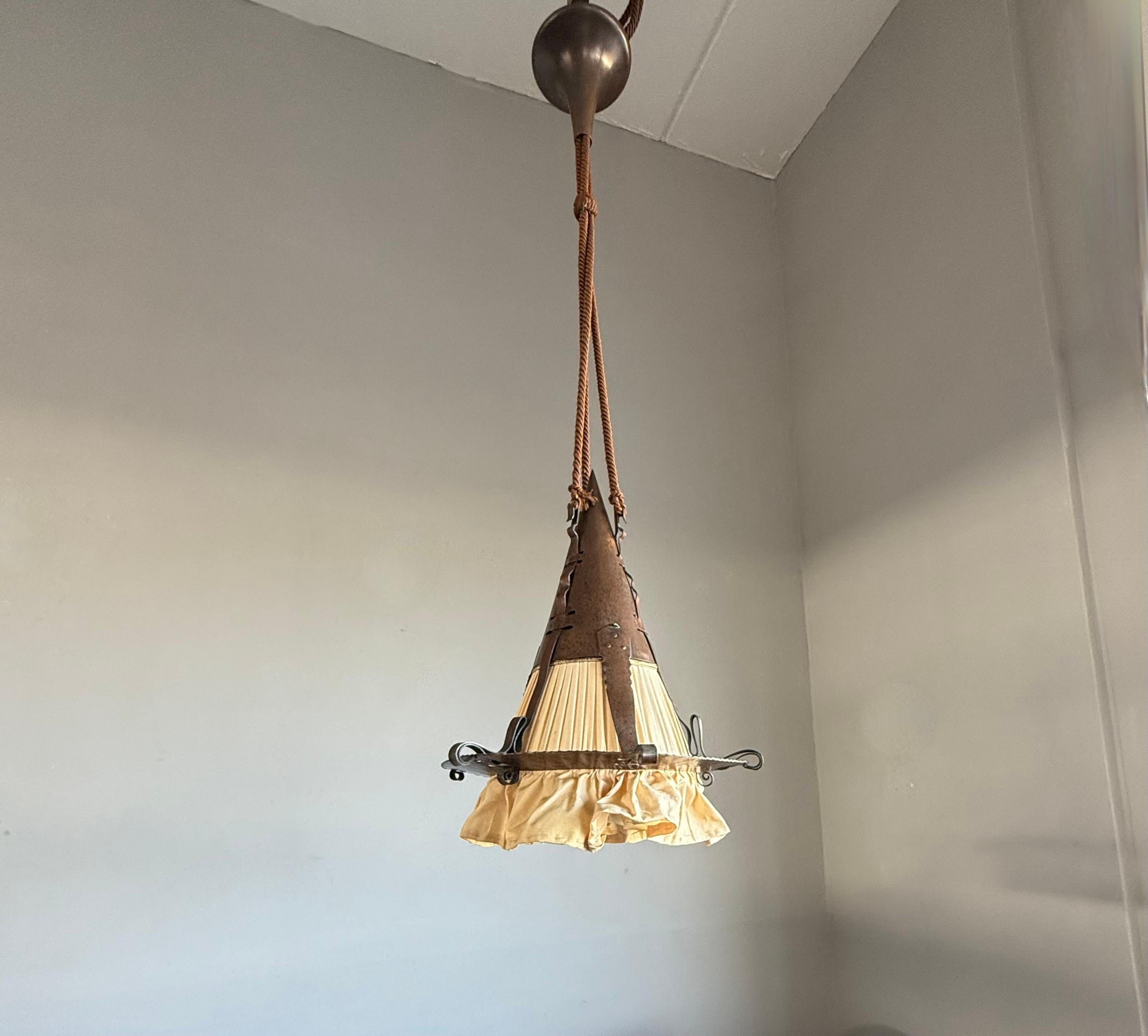 Perfectly handmade Arts and Crafts lantern, ceiling light.

Finding rare or unique light fixtures always makes our day and when we came across this handcrafted copper Dutch pendant we were immediately 'sold'. The calm and stylish look and feel of