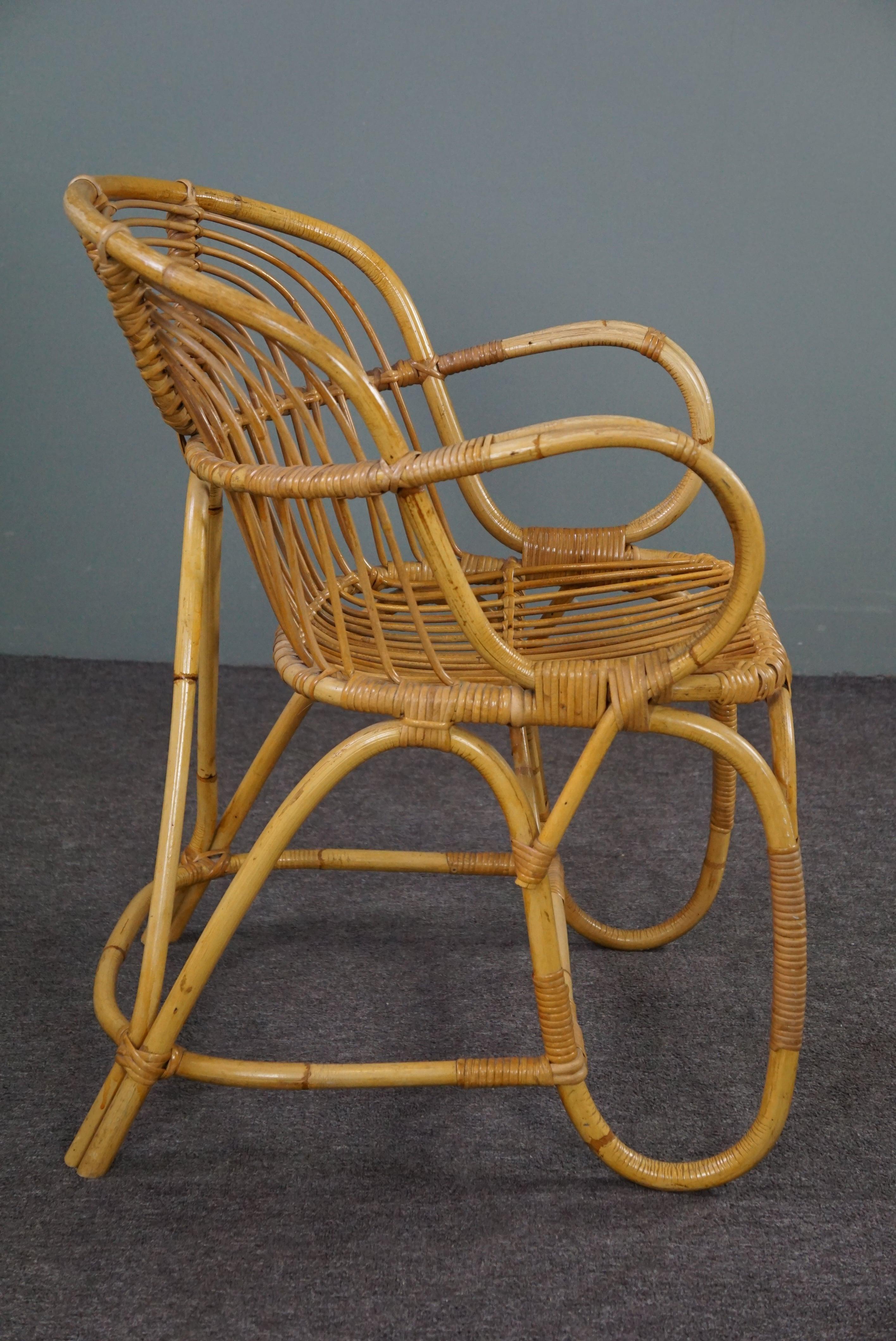 Hand-Crafted Rare Dutch Design rattan armchair, 1950 For Sale