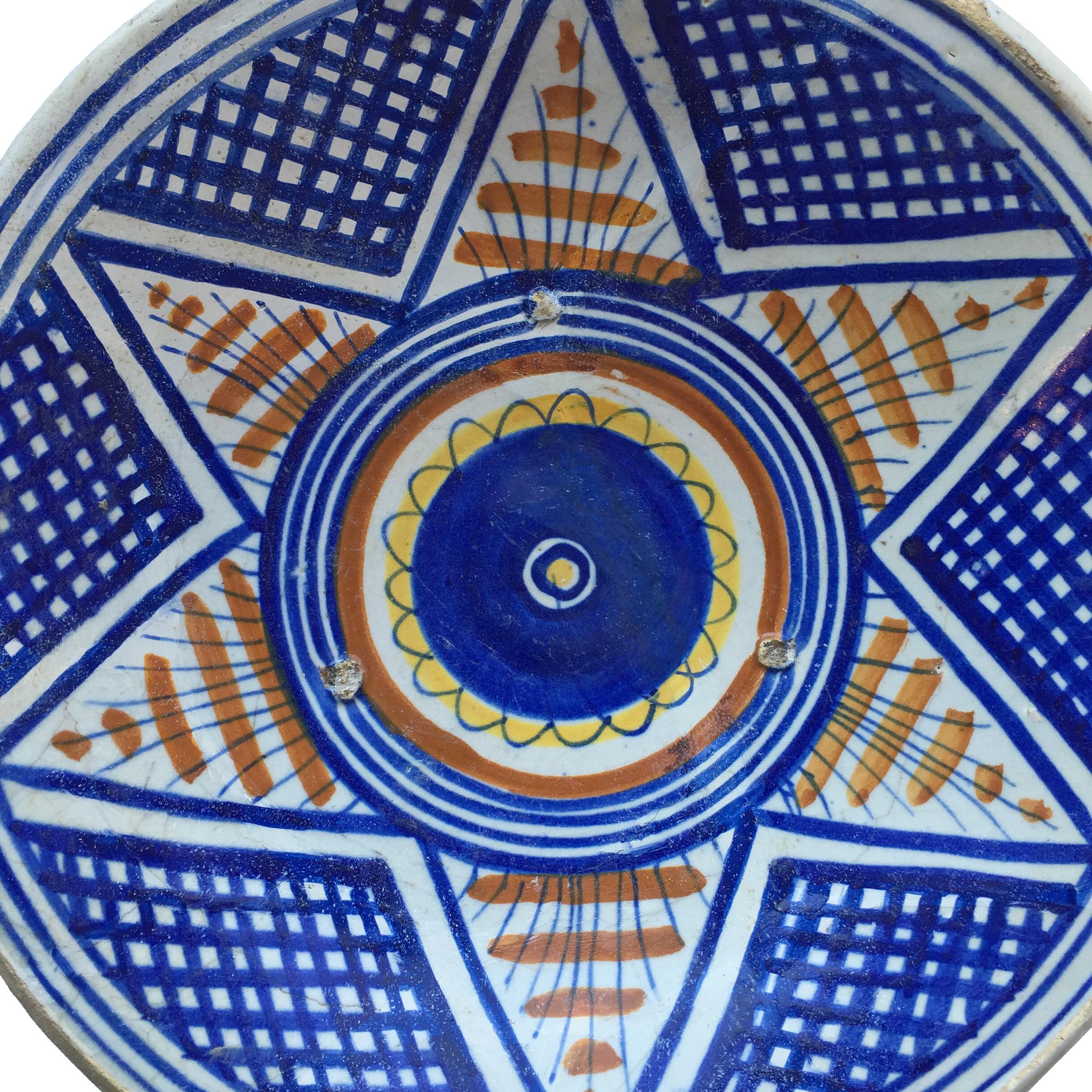 A rare Dutch Majolica plate with a star design.
Northern Netherlands, probably made in the city of Haarlem.
Made 1560 - 1580

Dutch majolica is one of the more rare ceramics known, especially in a condition where it is almost complete. Dutch