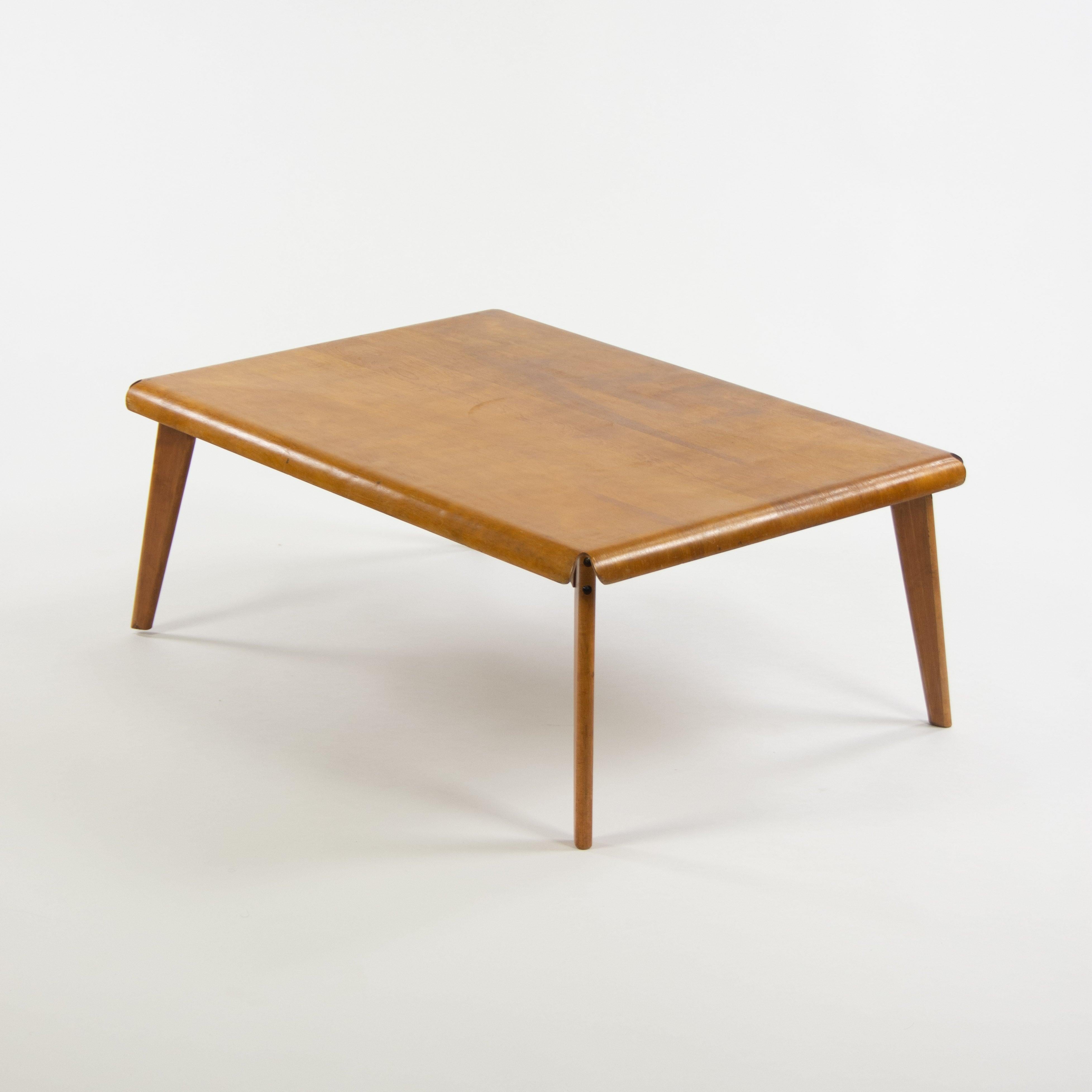 Listed for sale is a very rare and early Evans plywood coffee table, produced by Evans Molded Plywood Division and designed by and with Charles and Ray Eames.

Two or so of these tables have surfaced to market in recent years, notably at Wright