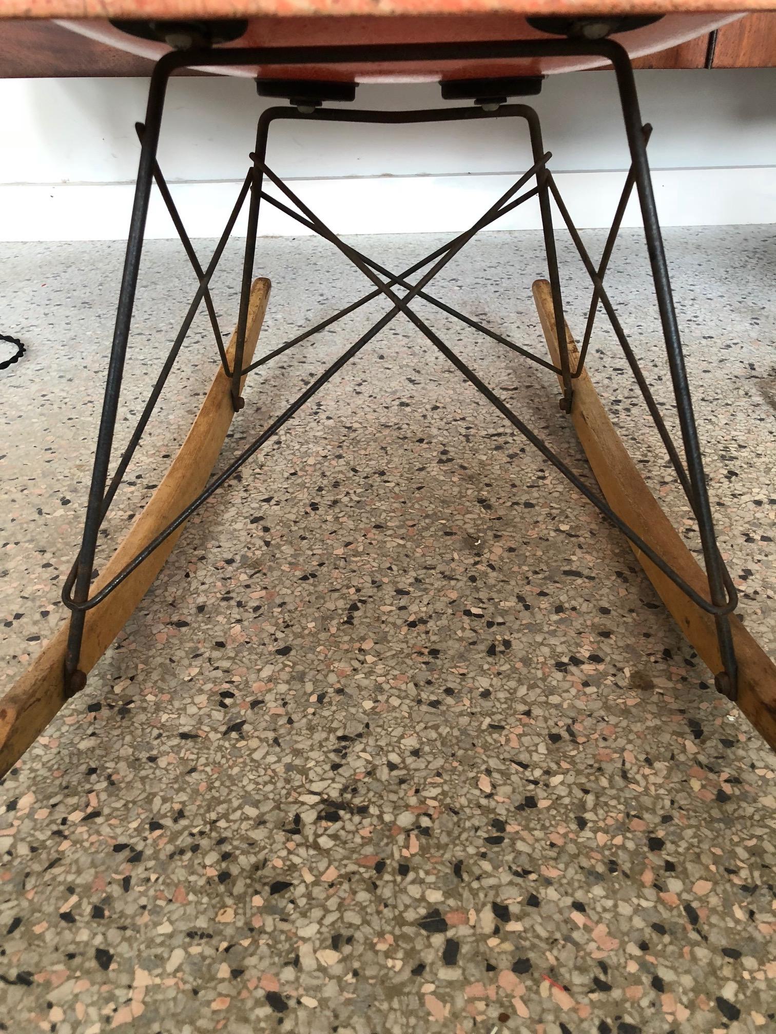 A fantastic and rare first edition, circa 1950, Eames RAR rocking chair with original Zenith rope edge shell and original to the chair birch runners and base.