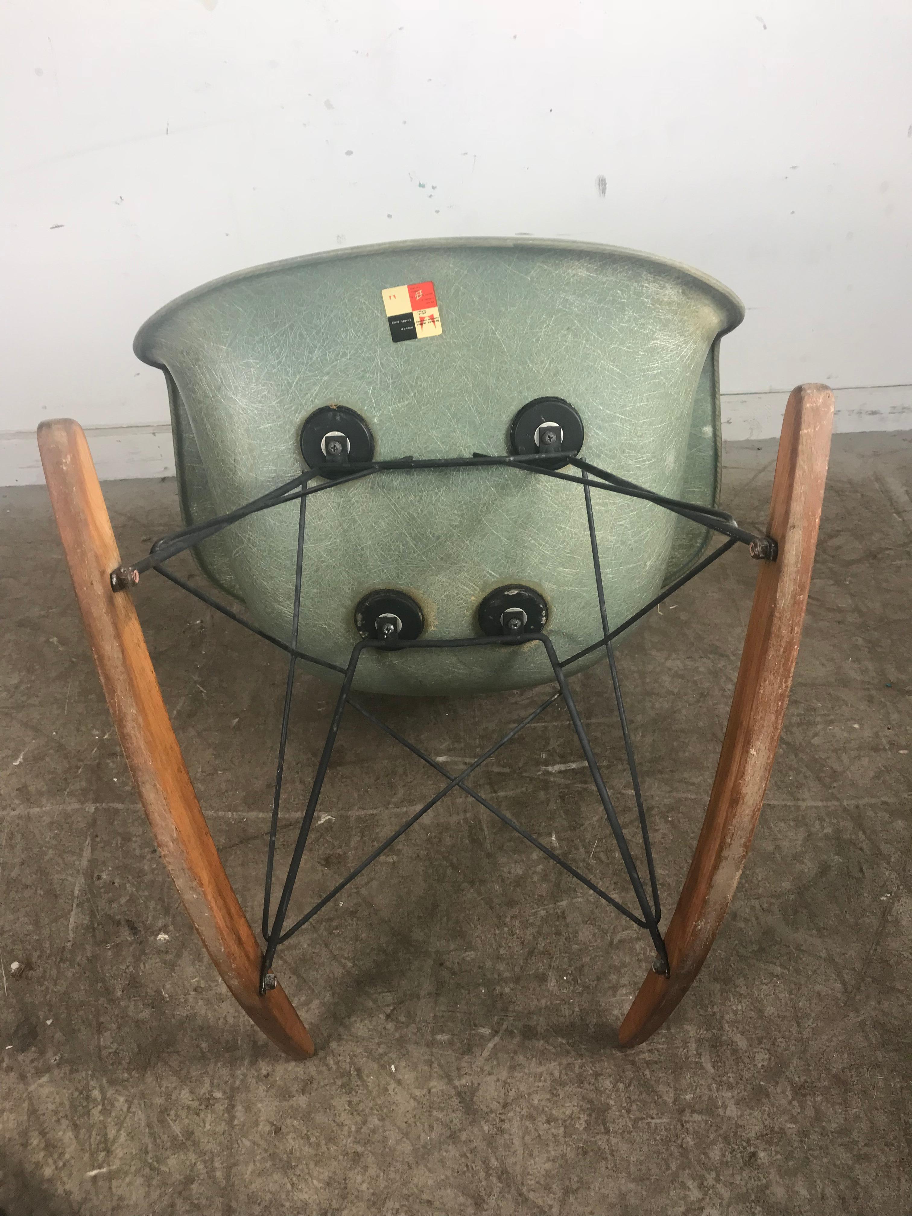 Rope edge Eames RAR rocker in extremely rare sea-foam green from the first or second year of production. In as found condition with no repairs. No cracks. Minor staining to shell seat. Normal wear. Wonderful exposed fibers, visible rope around the