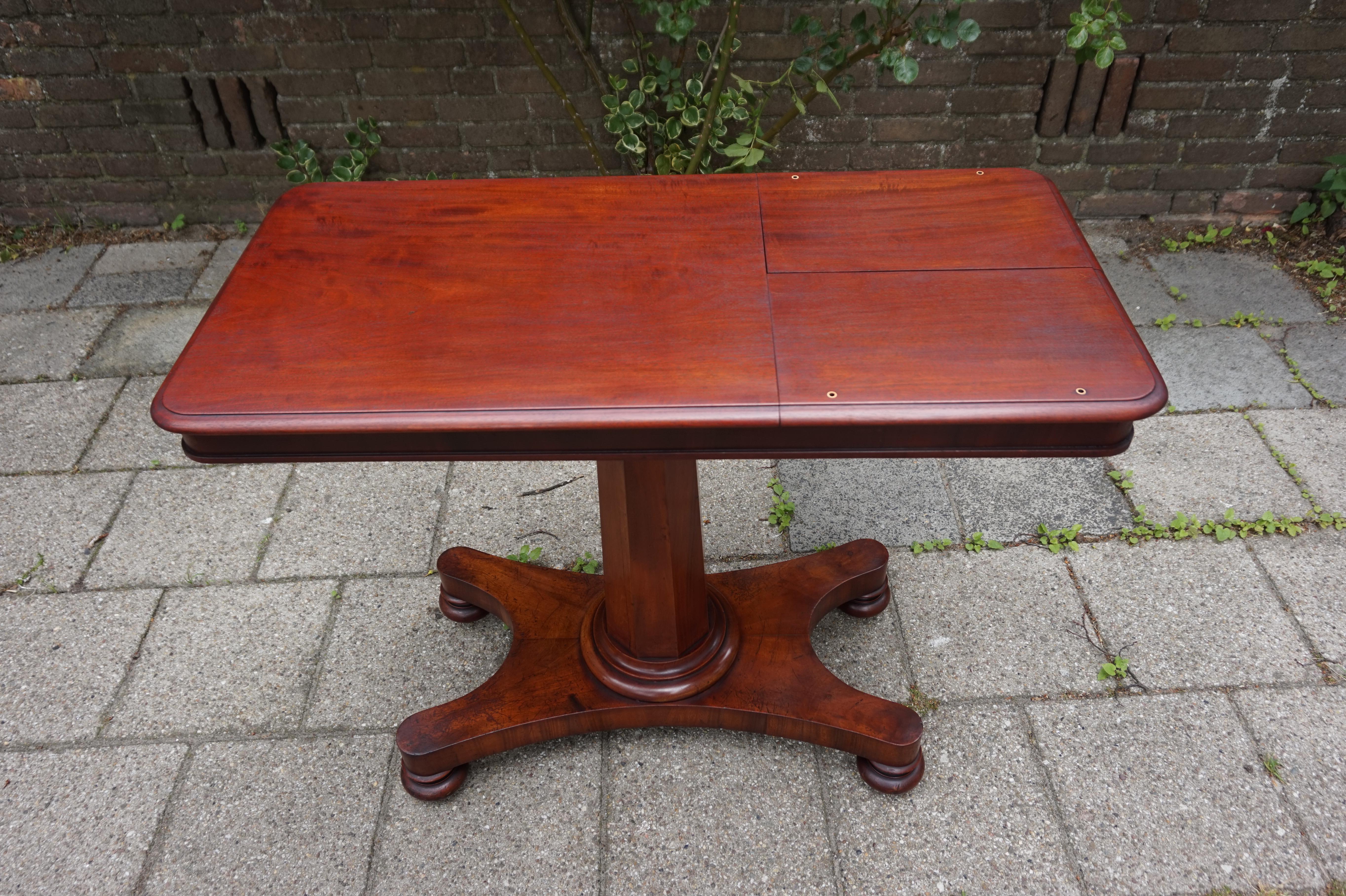 Extraordinary and multi purpose antique table.

This amazing quality and excellent condition table must have been made by one of Britain's top furniture makers, but we cannot find a maker's mark. This mahogany table would only have been made for the