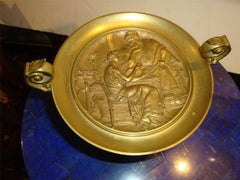 Raro centrotavola in bronzo dei primi del '900 con ritratto di uomo e donna in bronzo