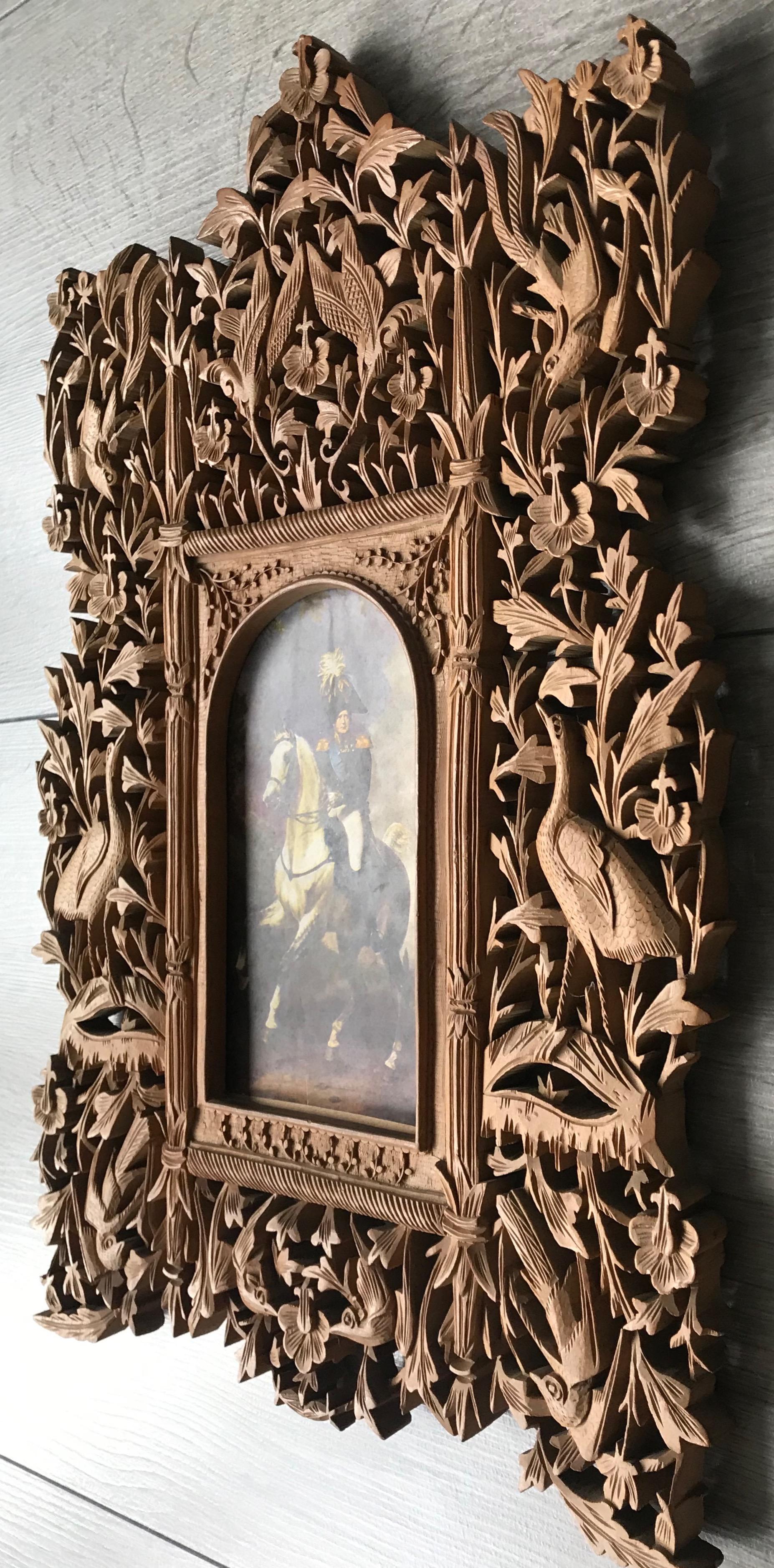 This rare and probably colonial picture / photograph wall frame comes with incredibly elaborate artwork.

This stylish and meaningful picture frame will make great decoration on your wall and with an image of a loved one inside, it will become even